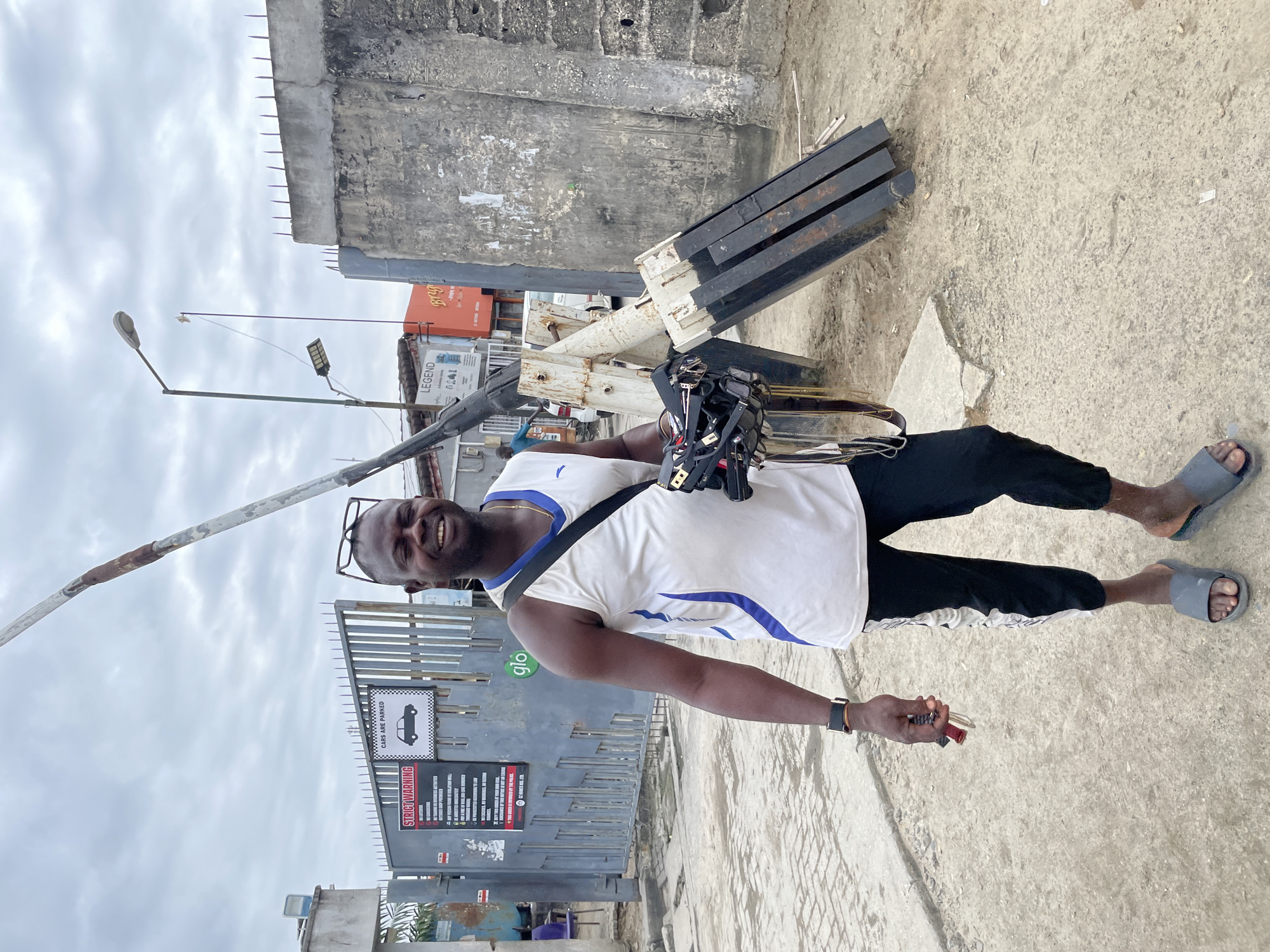 Midday street life in Lekki — traffic, motos, and urban hustle