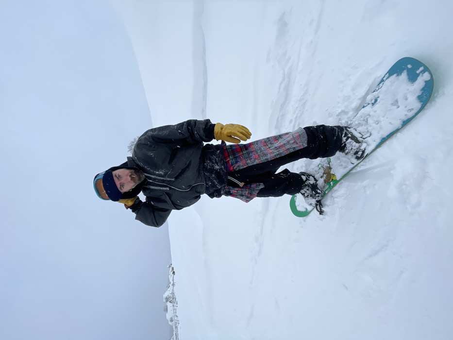 Snowboarder captured standing and lying in Montenegro mountain snow