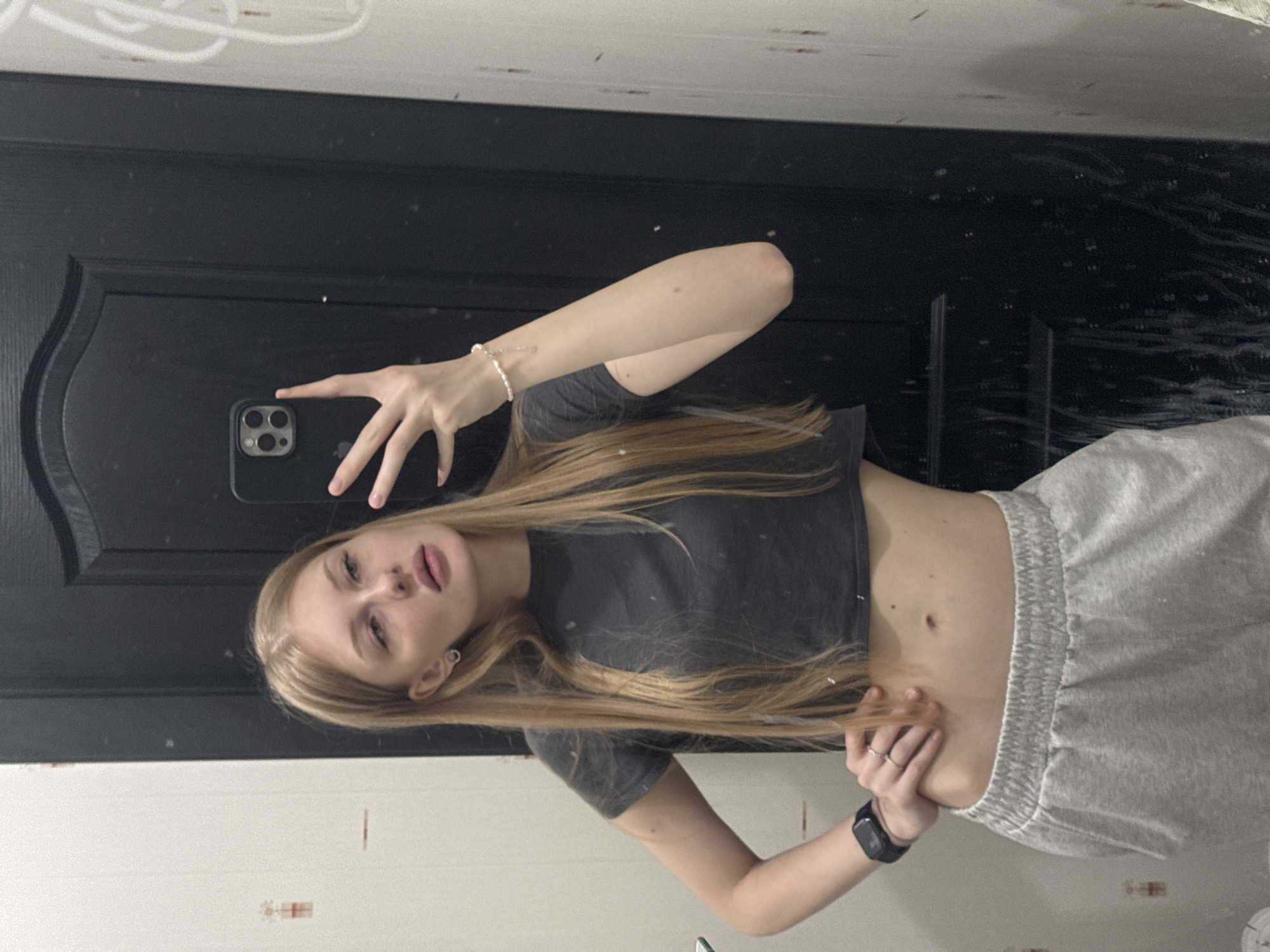 Casual selfie session across a Perm apartment and elevator