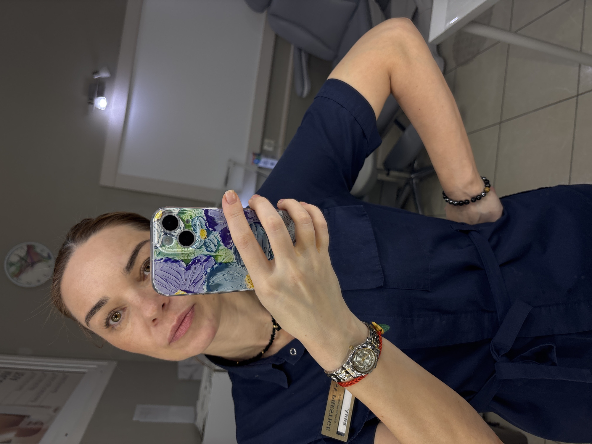 Woman documents selfie and manicure session in Murino