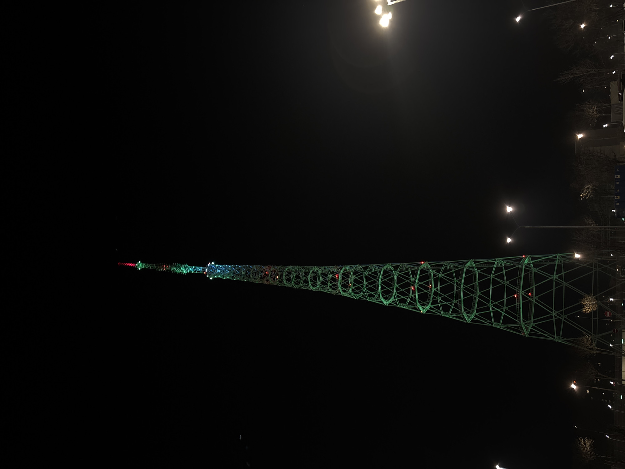 Perm Television Tower illuminated green at night in Russia