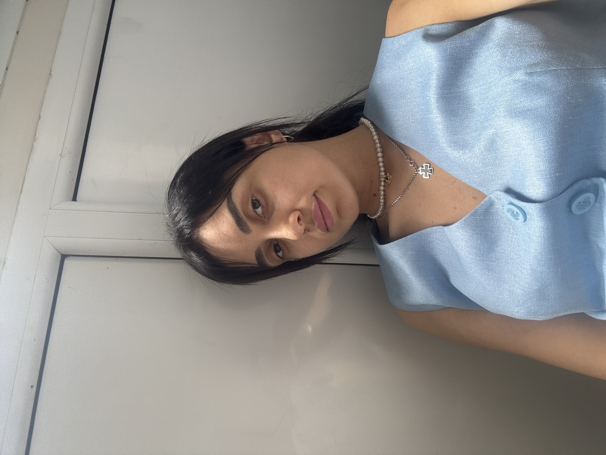 Morning portraits in Tbilisi, light blue top and pearls