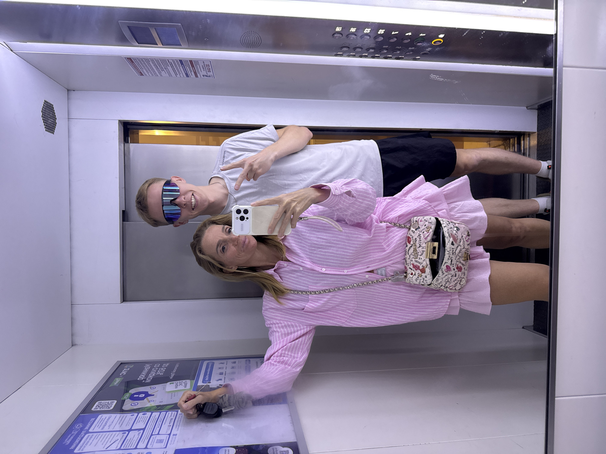 Two people take elevator selfie in Russia