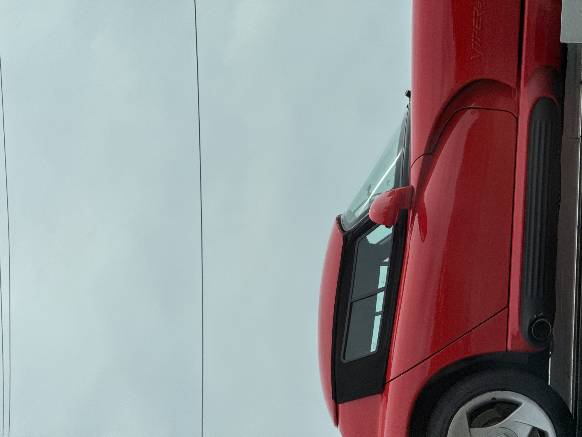 Red Dodge Viper spotted in vertical position in Los Angeles