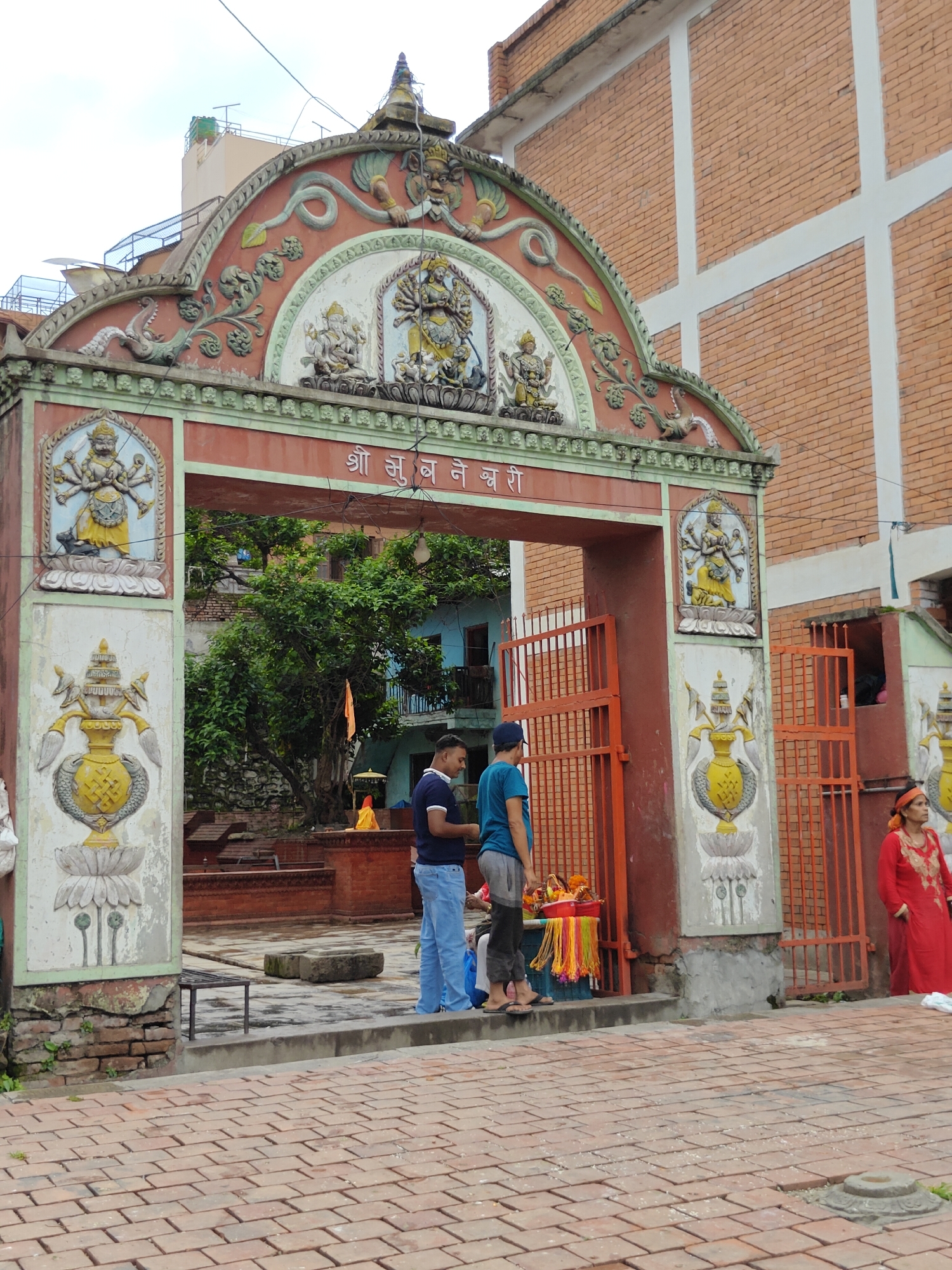 Temple complex details and street life in central Kathmandu