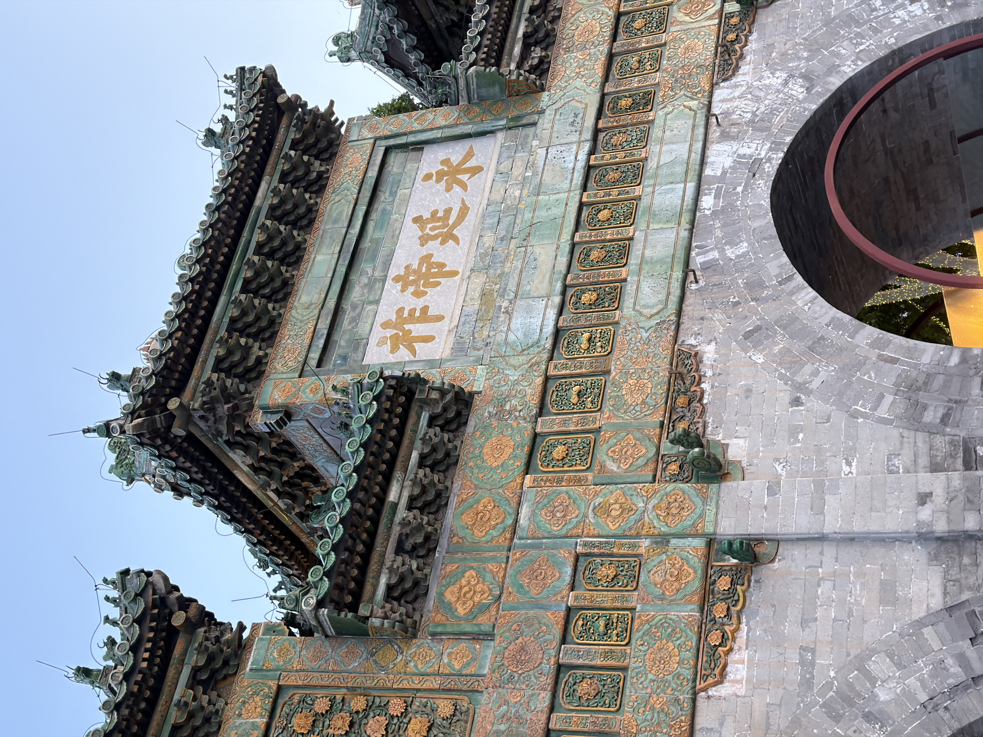 Tourist visits ornate Deheyuan Theater at Beijing Summer Palace