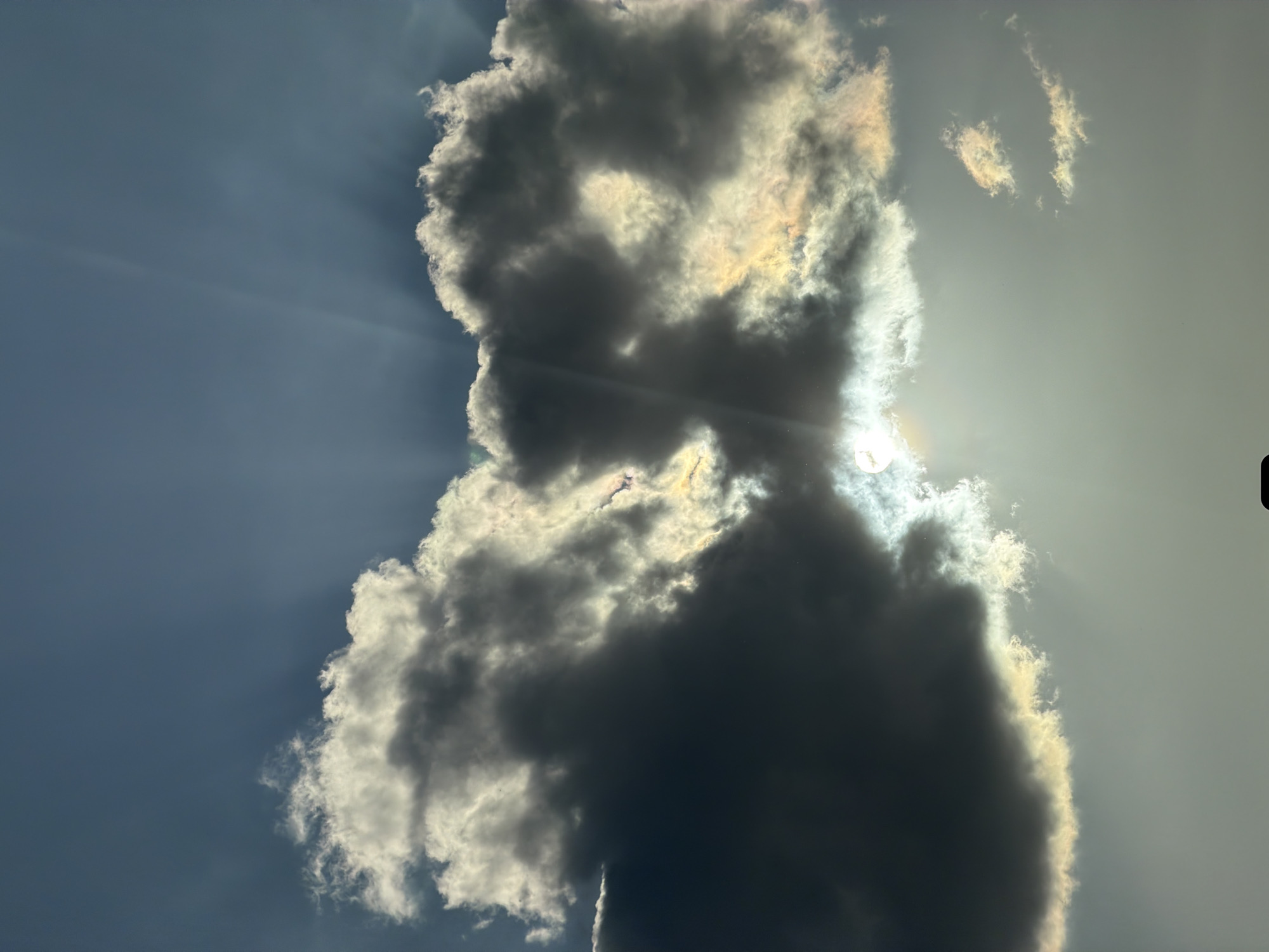 Ordinary moments captured in Esch-sur-Alzette: clouds, metal, dog