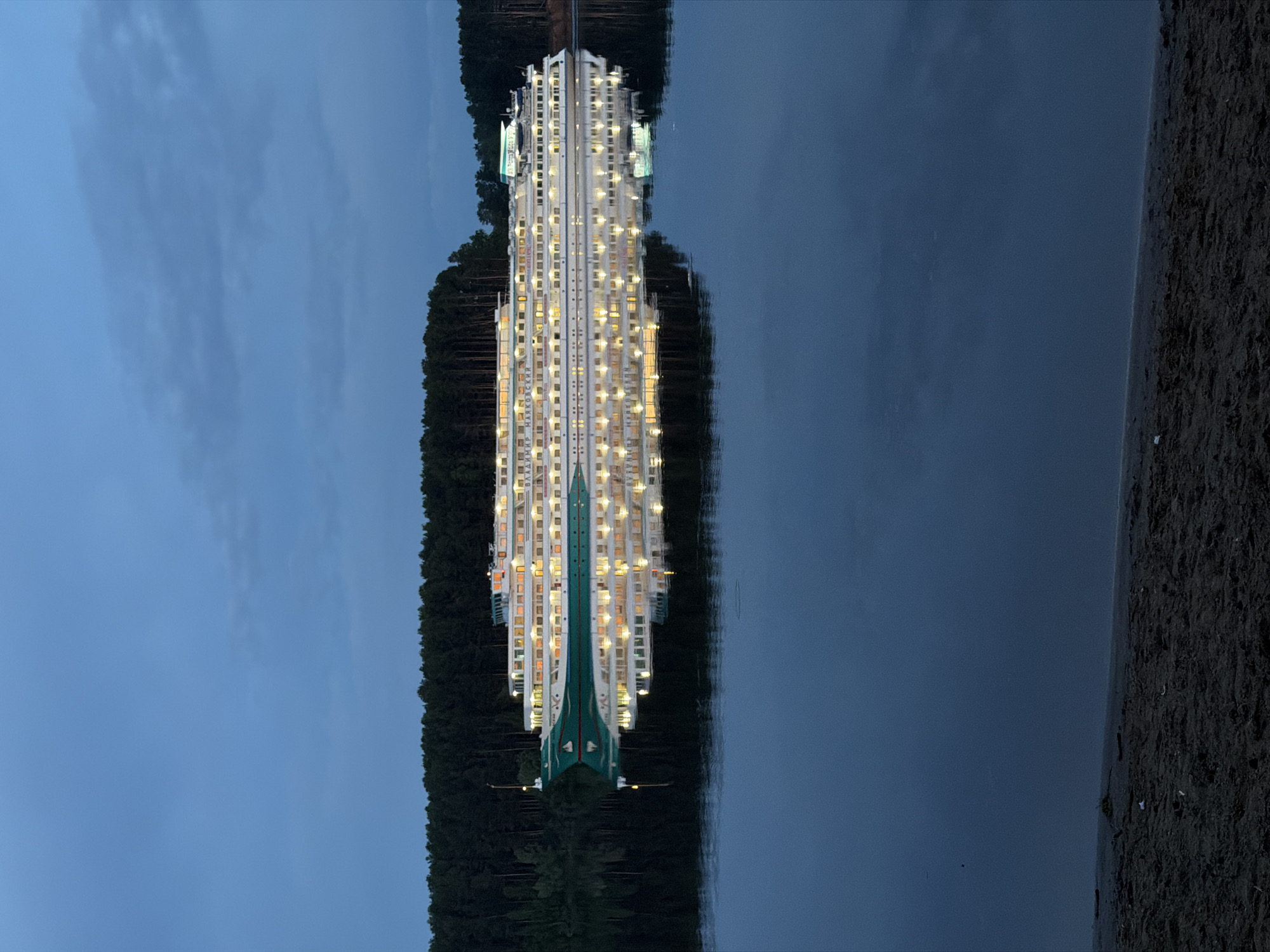 Cruise ships dock in Chaikovsky as evening fishing continues