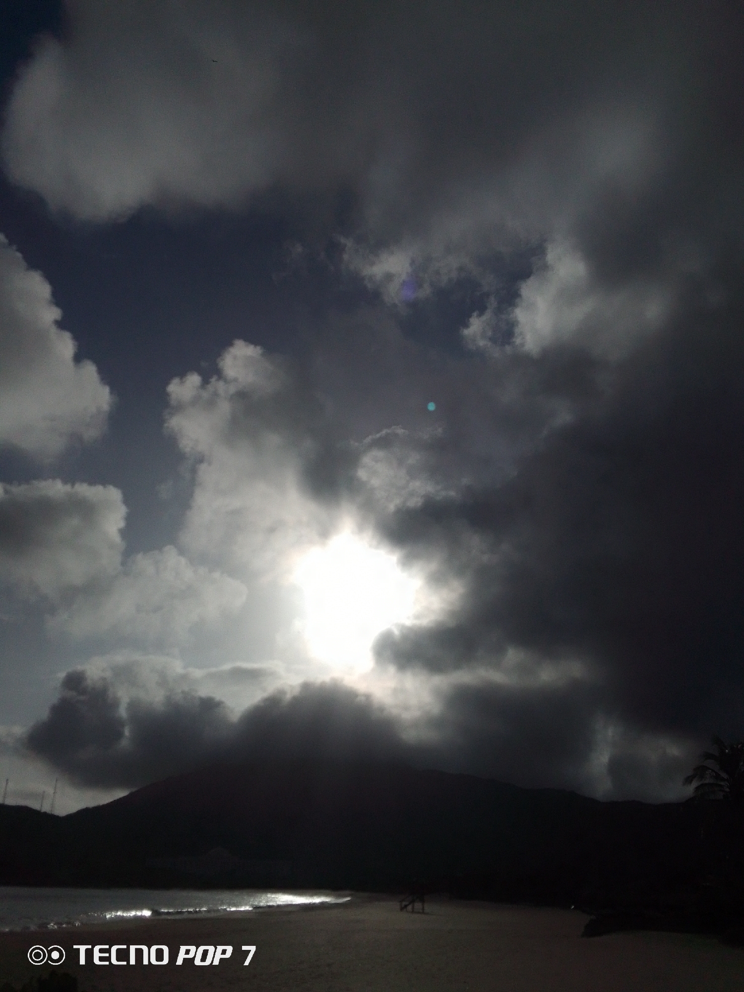 Dramatic storm clouds photographed over Venezuelan beach during morning hours