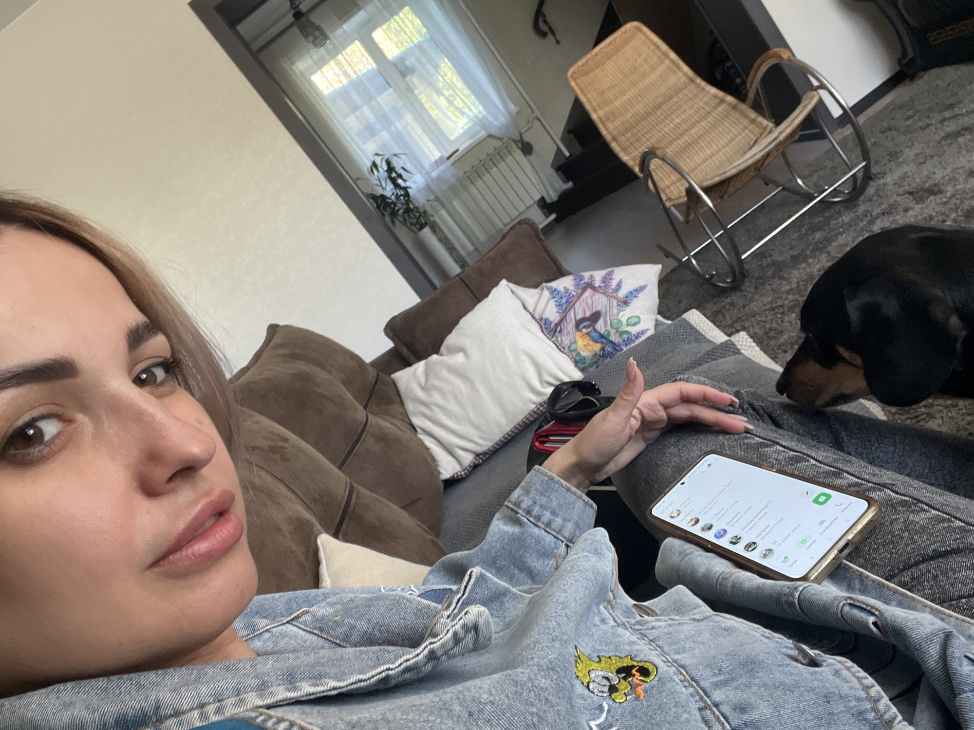 Child and dachshund share quiet moments at home