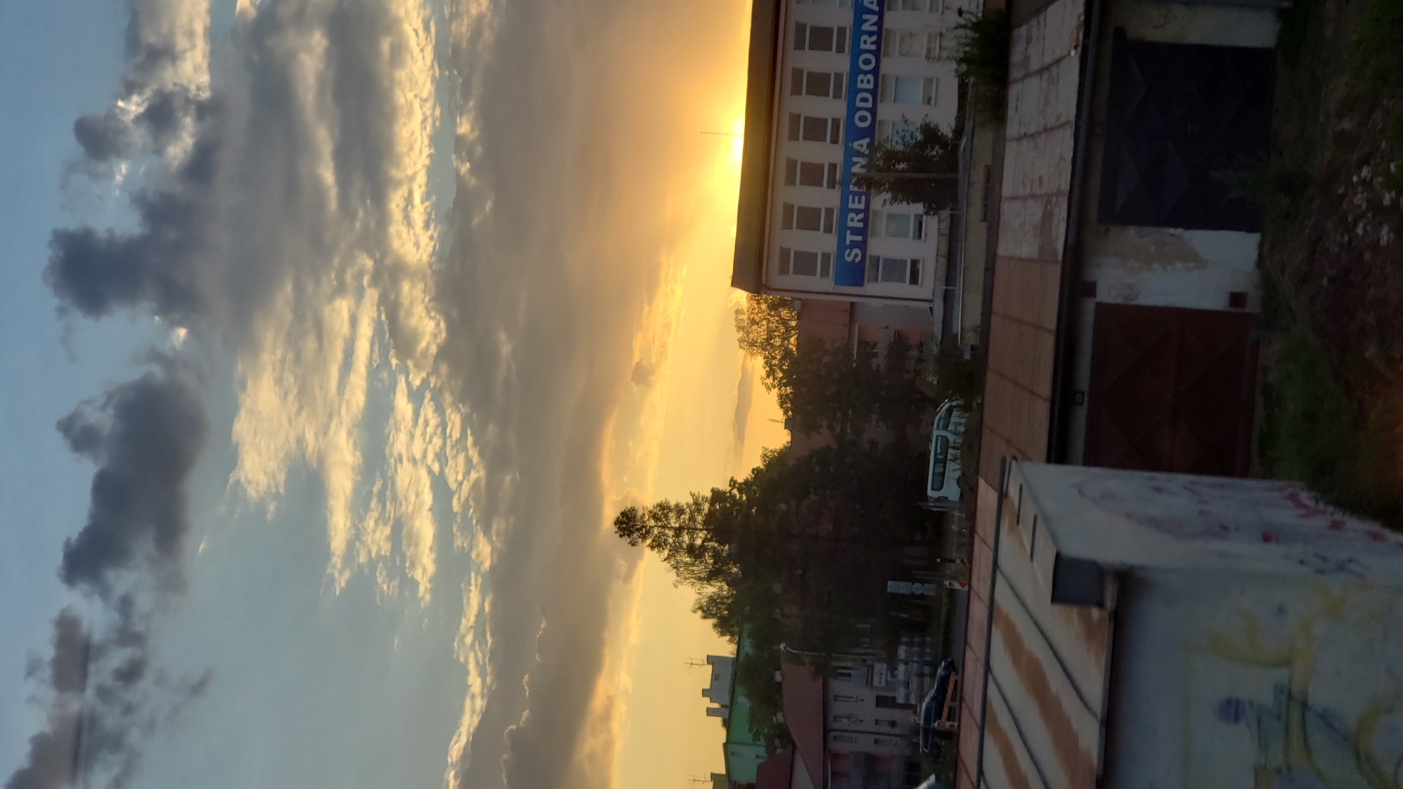 Poprad residential skyline at sunset, July 2026
