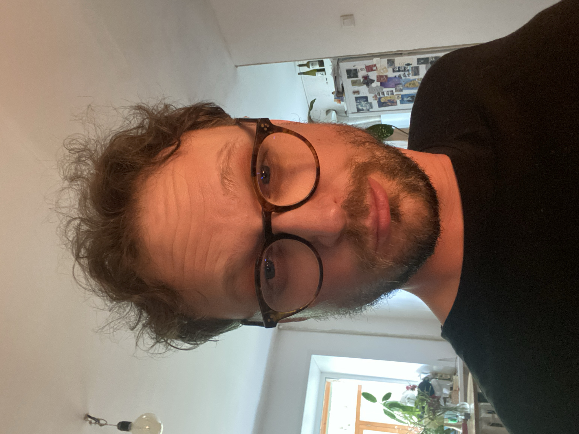 Casual self-portrait session, indoors and out, black shirt