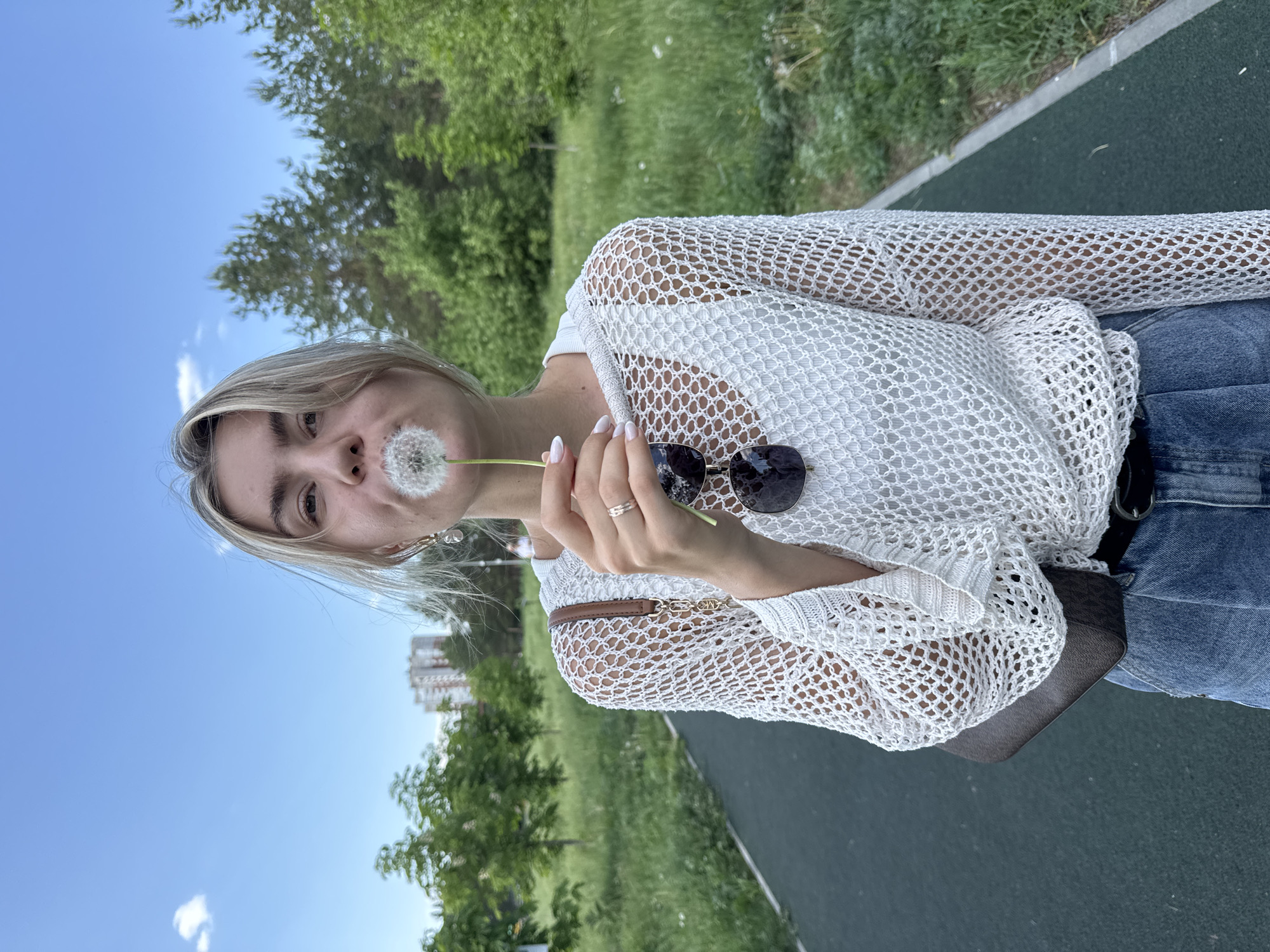 Spring afternoon scenes: women in white, pink-dyed poodle