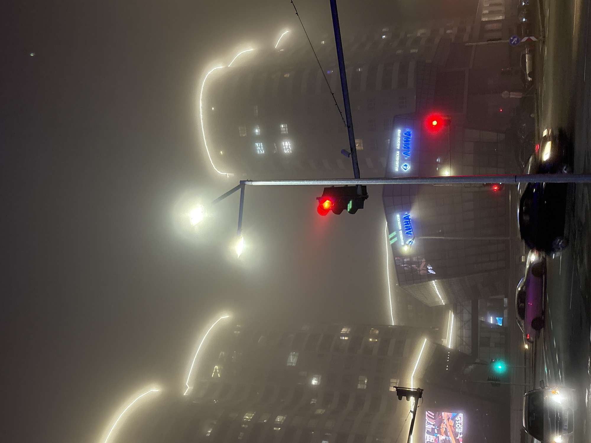 Heavy fog shrouds Burgas, Bulgaria streets and buildings