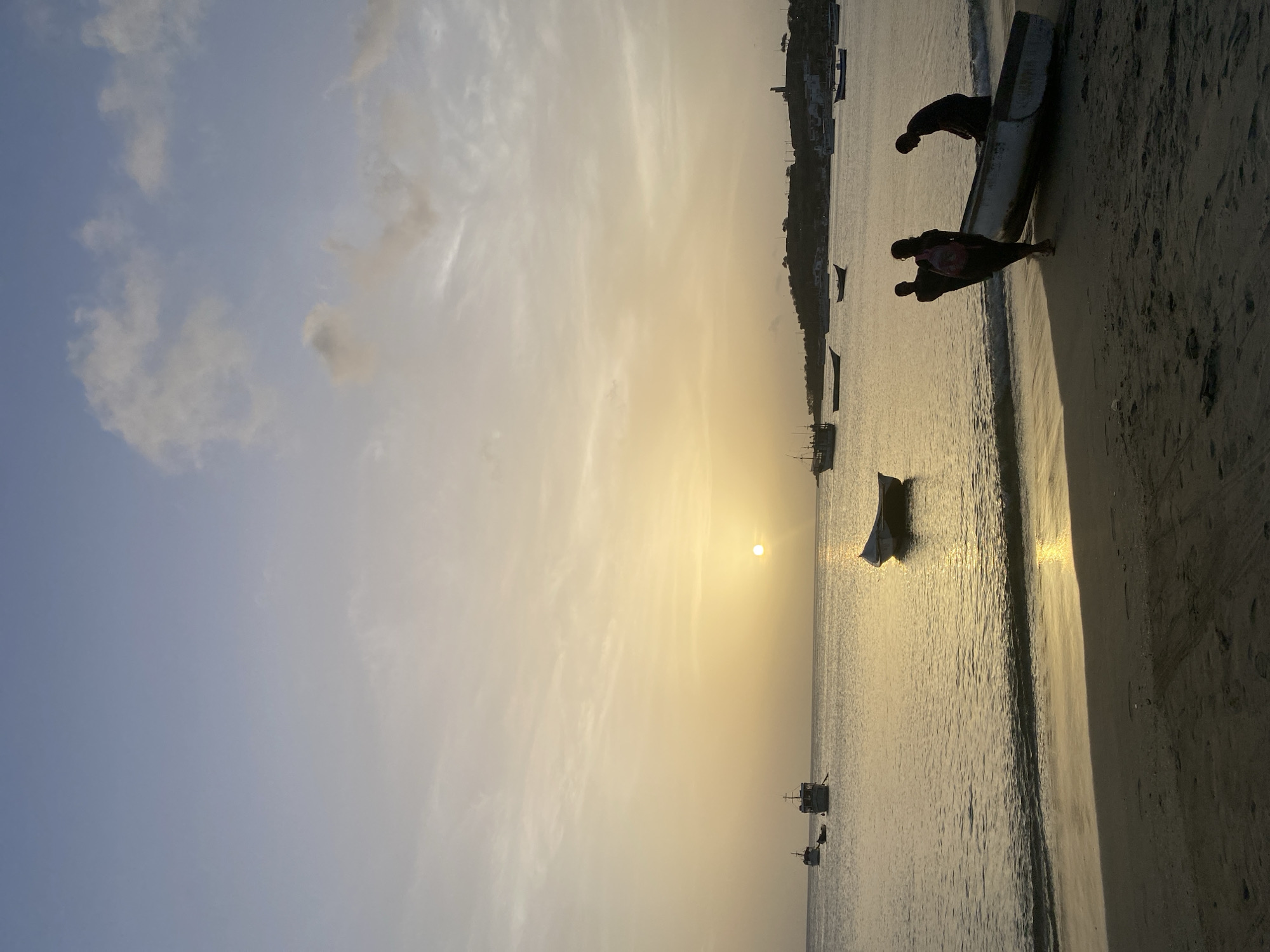 Boats, beach, and a golden sunset in Juan Griego