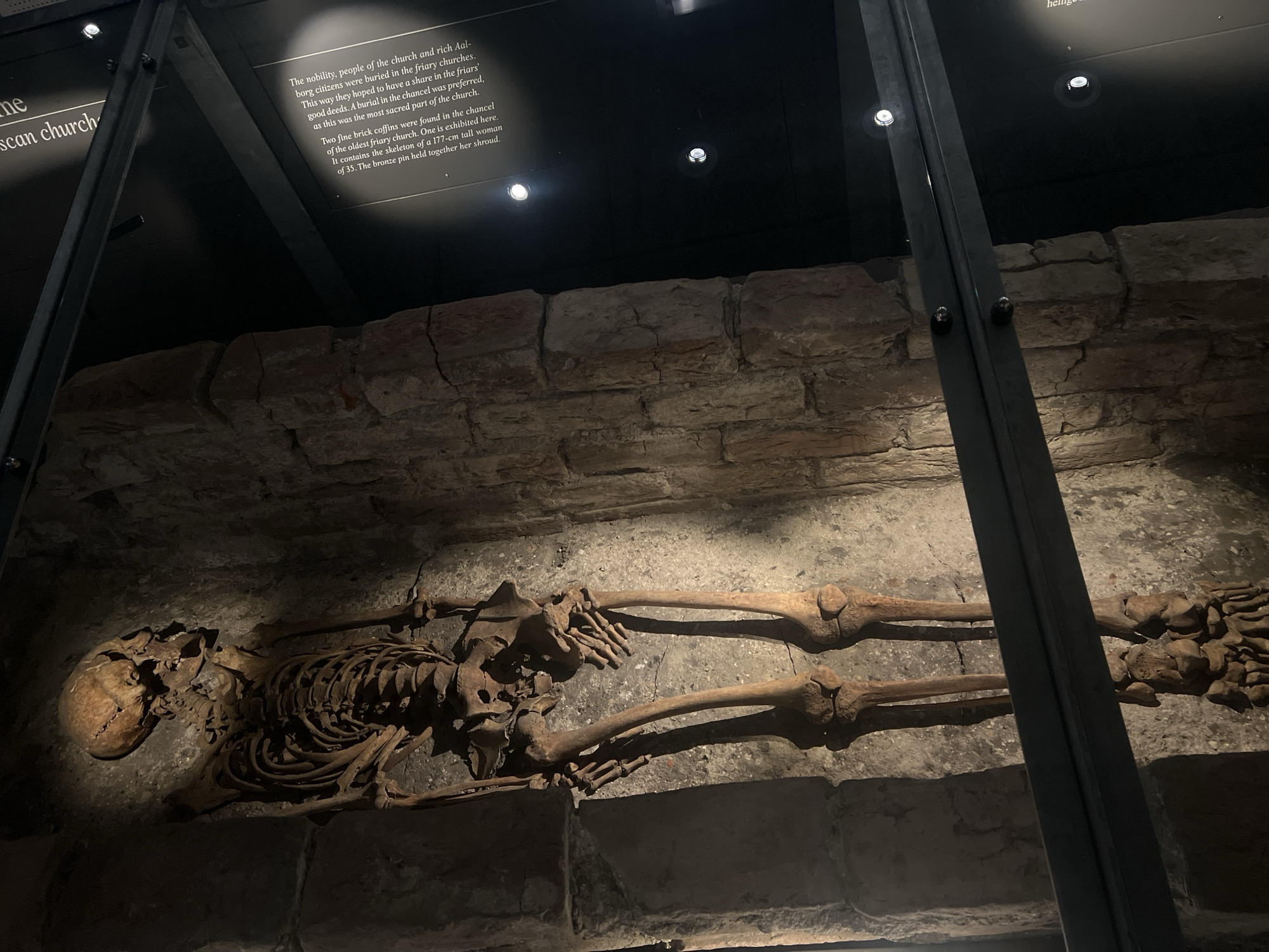 Visitor documents historic sites and streets in Aalborg