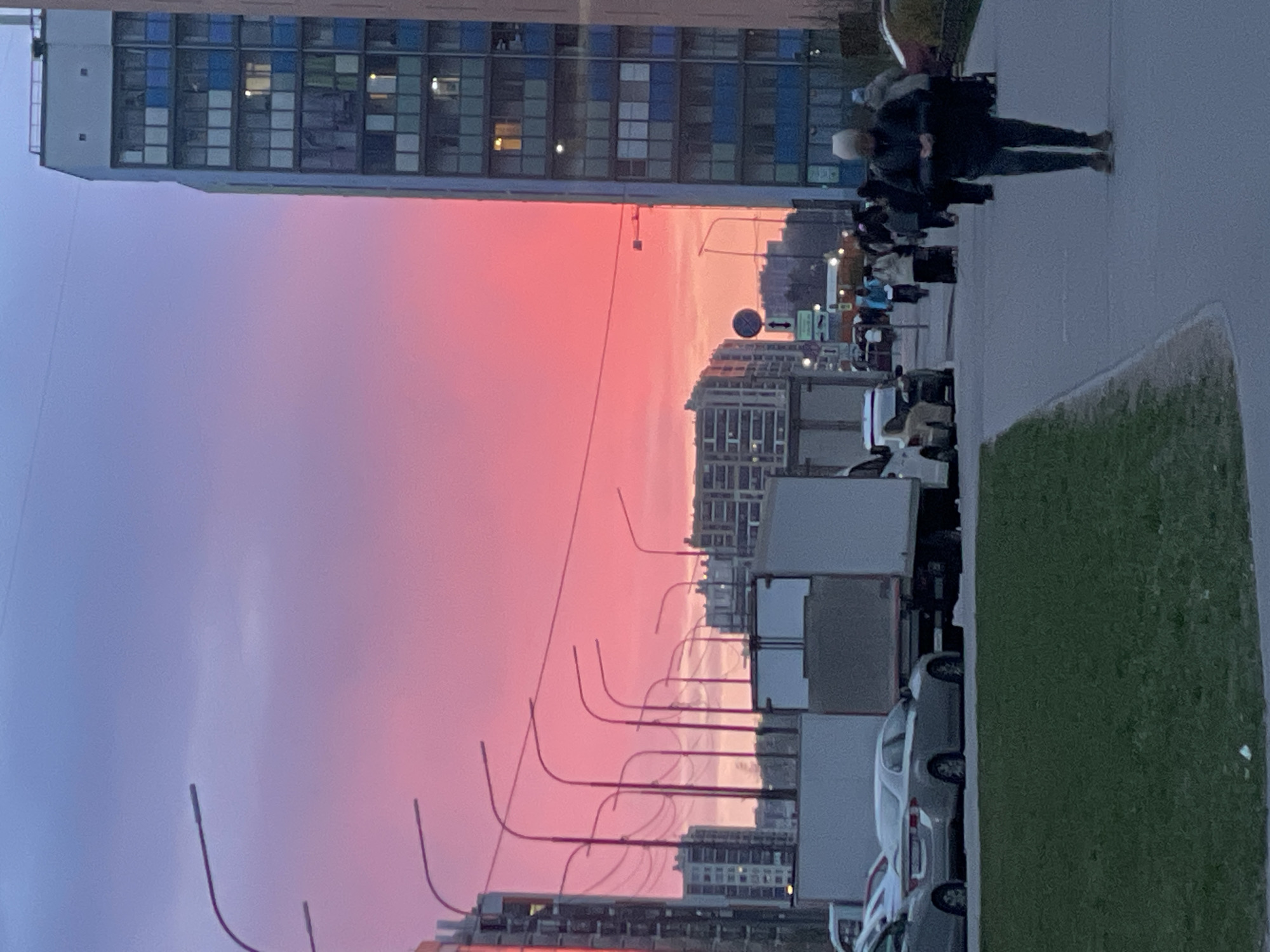 Vibrant sunset colors illuminate Murino, Russia street scene