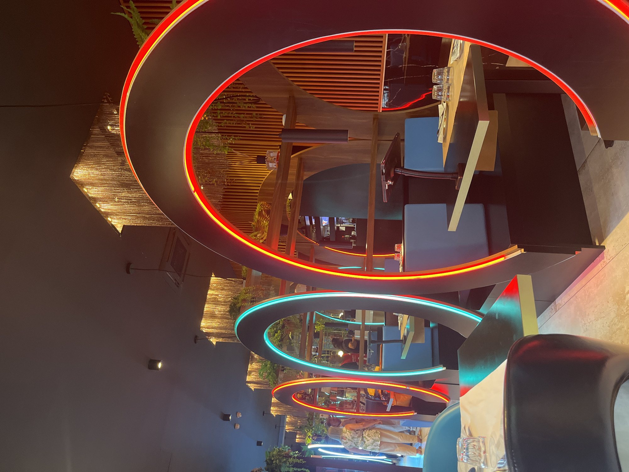 Neon-lit Rome restaurant serving Asian-style roasted duck