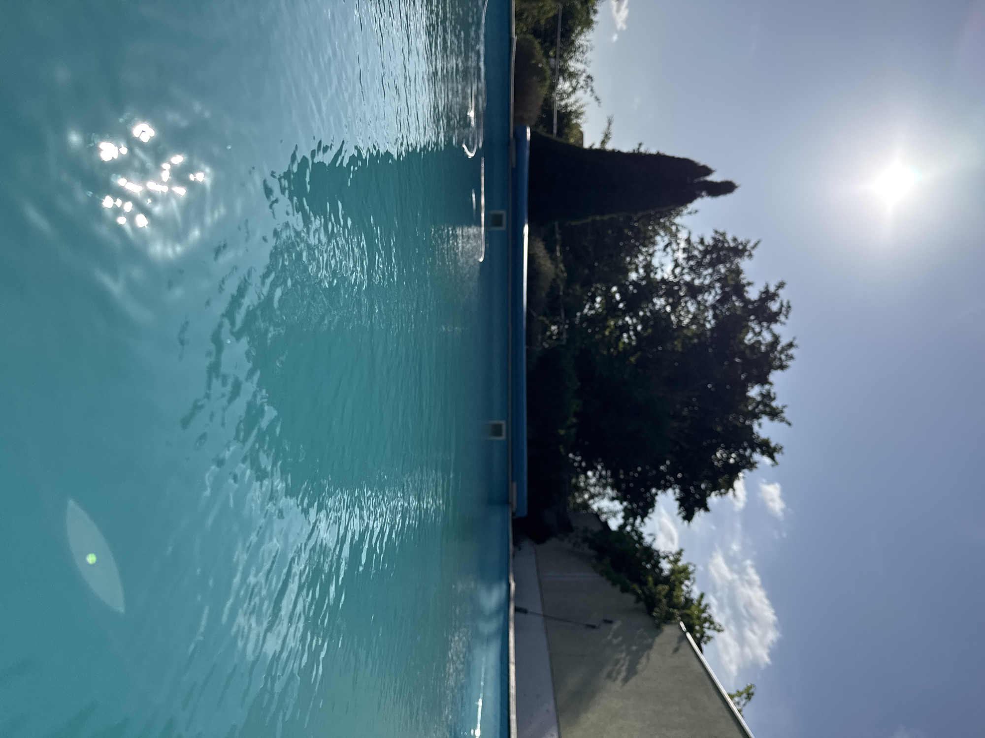Sunny afternoon at an outdoor pool in Wettstetten