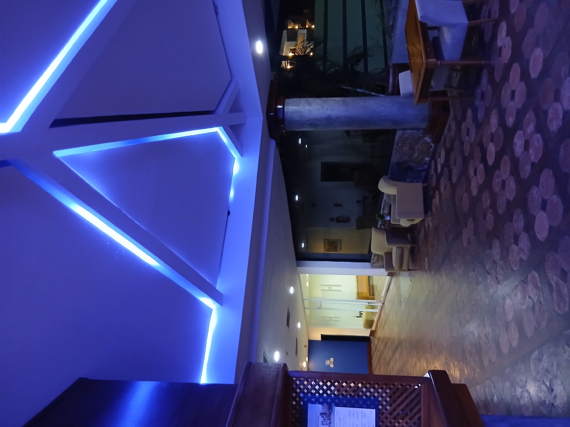 Colorful nighttime venue interior documented in Playa El Agua