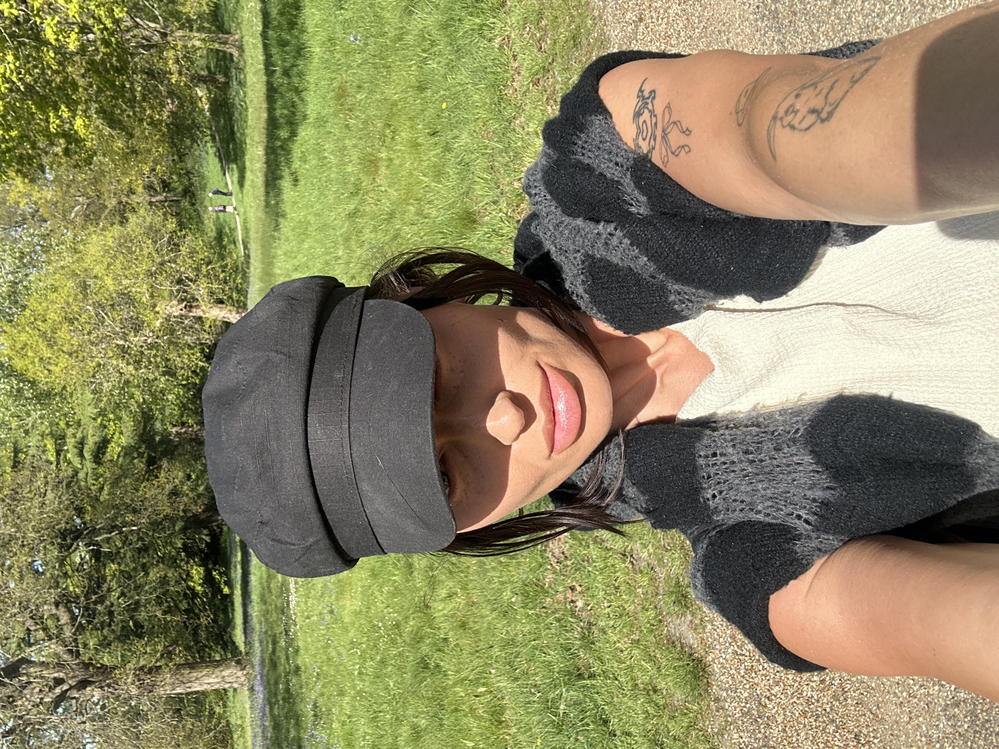 Woman takes outdoor selfies in Tunbridge Wells spring setting