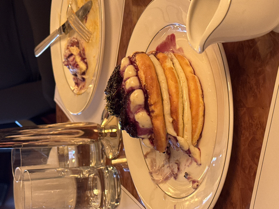 Diners enjoy gourmet pancakes at upscale restaurant