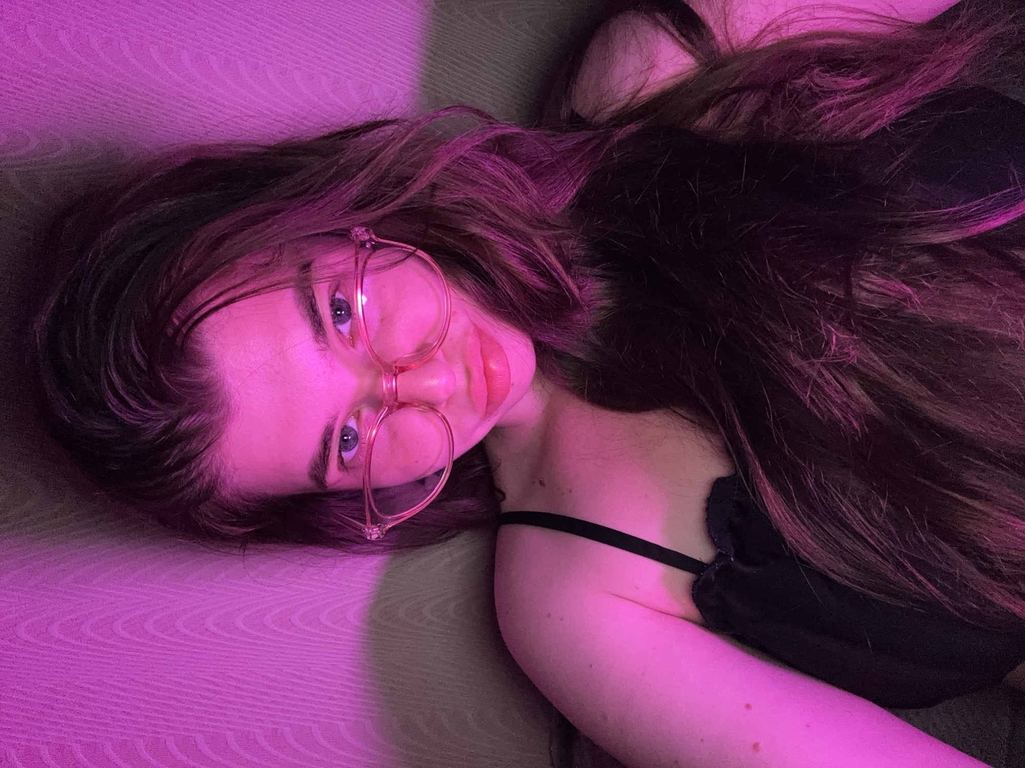 Indoor photo session with pink lighting in Мещёры