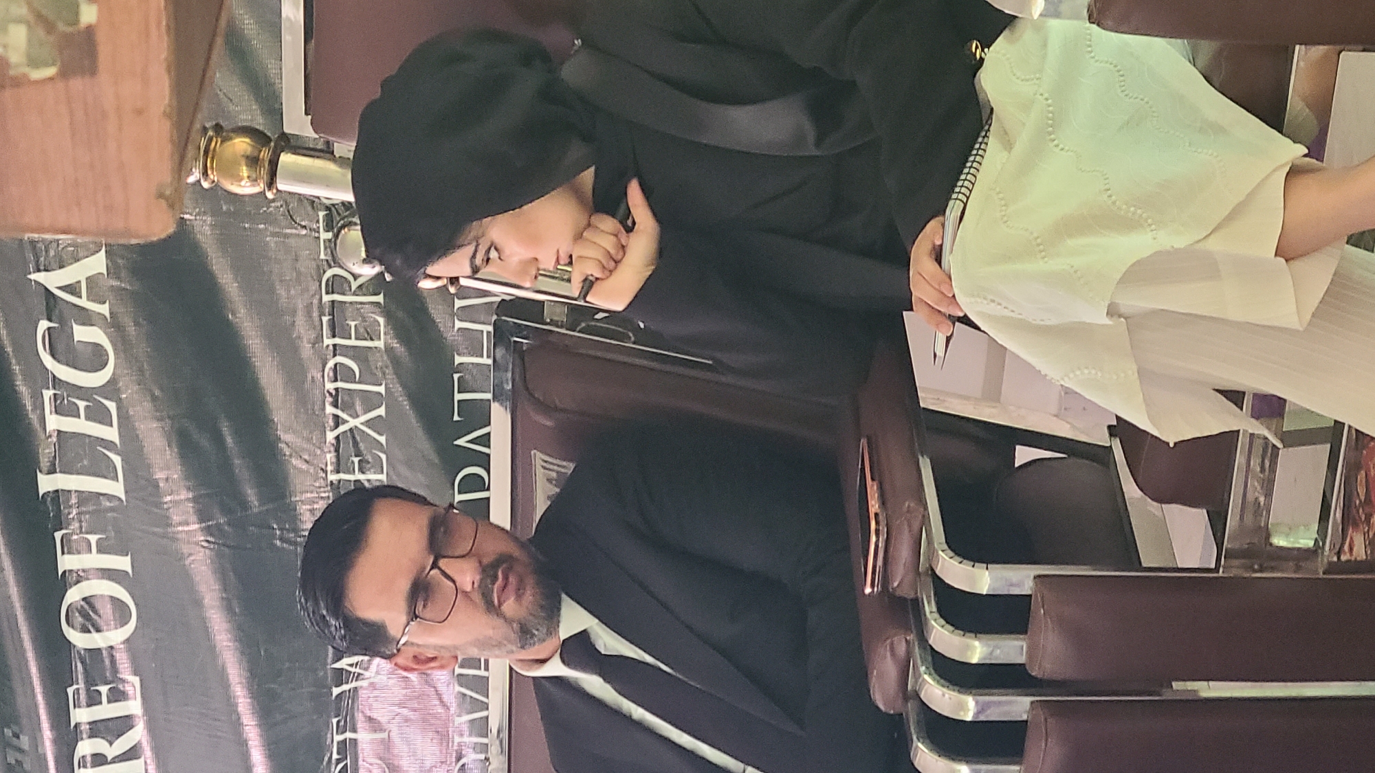 Man speaks at formal conference in Pishin, Pakistan