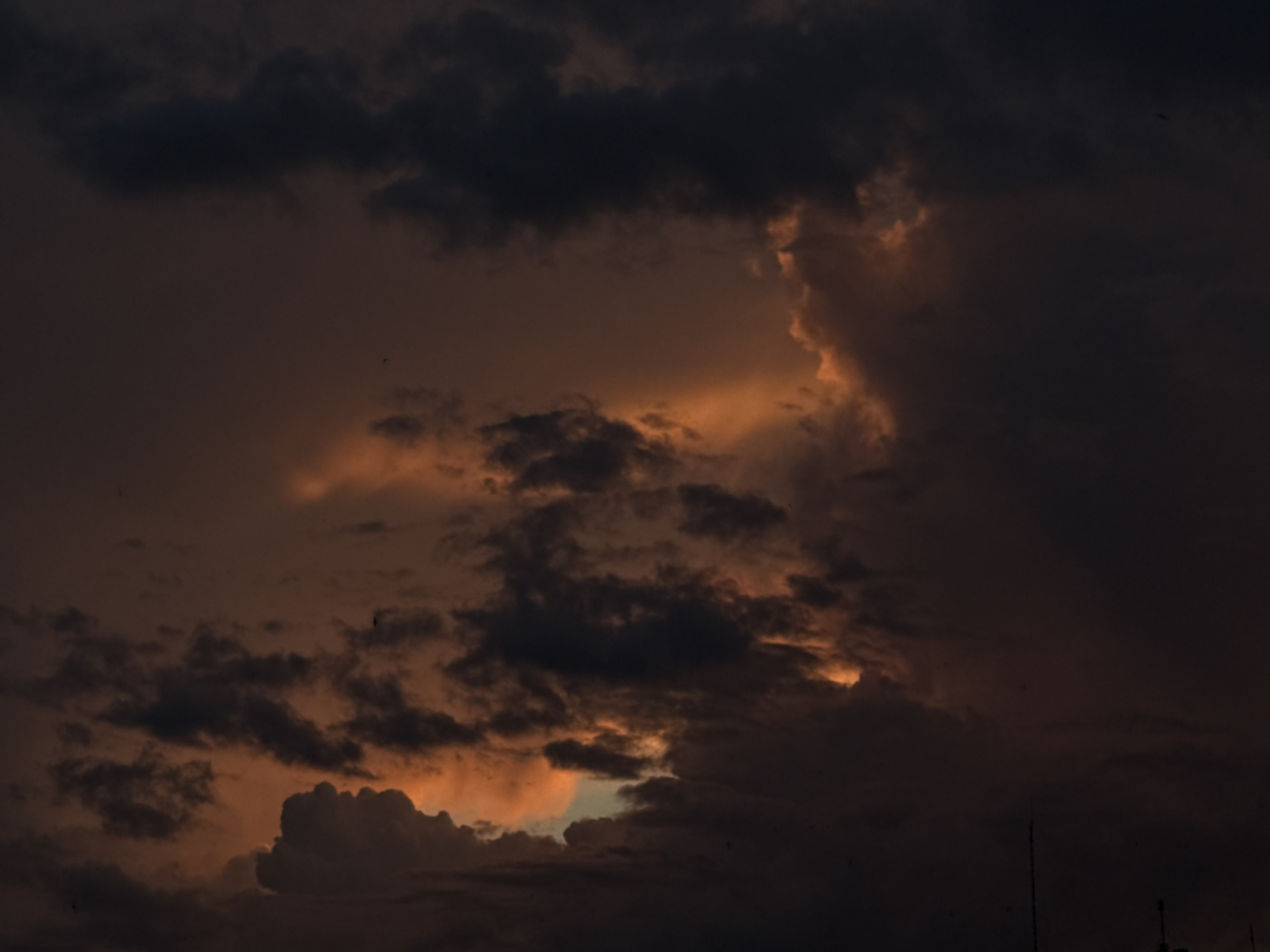 Stormy sunset skies over Luhansk, watched from a windowsill