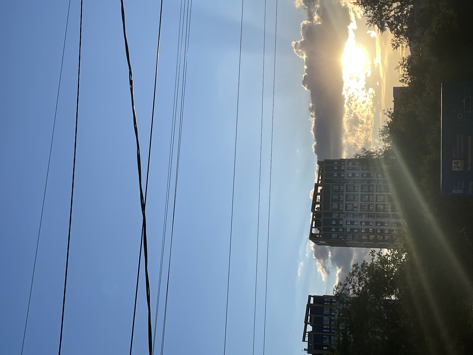 Sunny afternoon life documented across Izhevsk neighborhoods