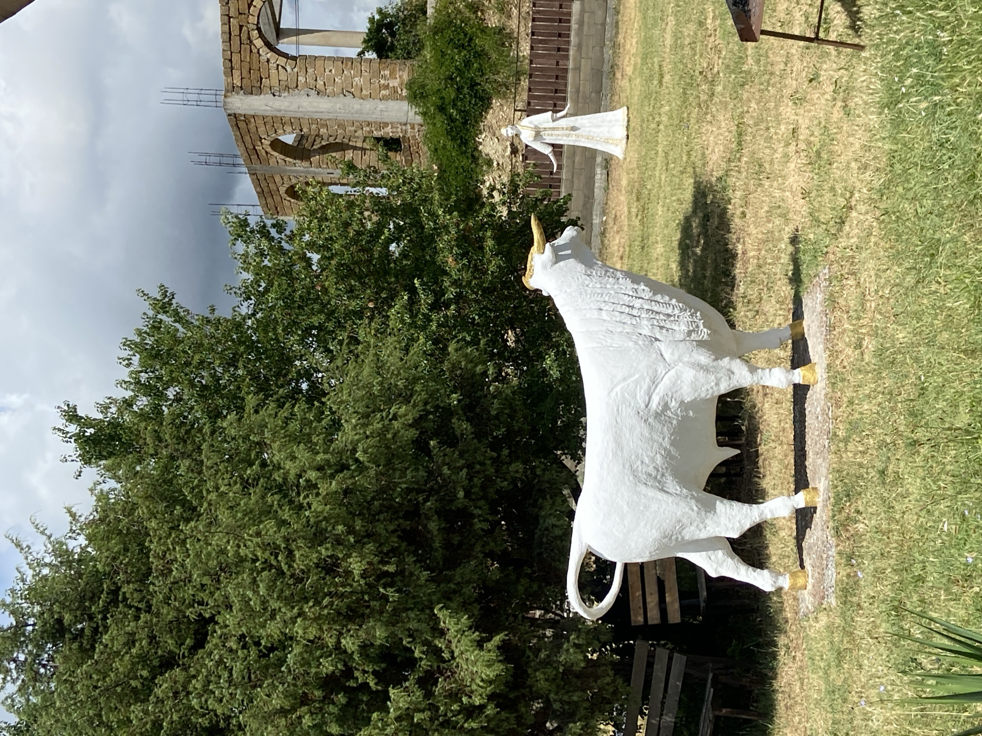 Bull sculpture and valley views at a rural Ukrainian overlook