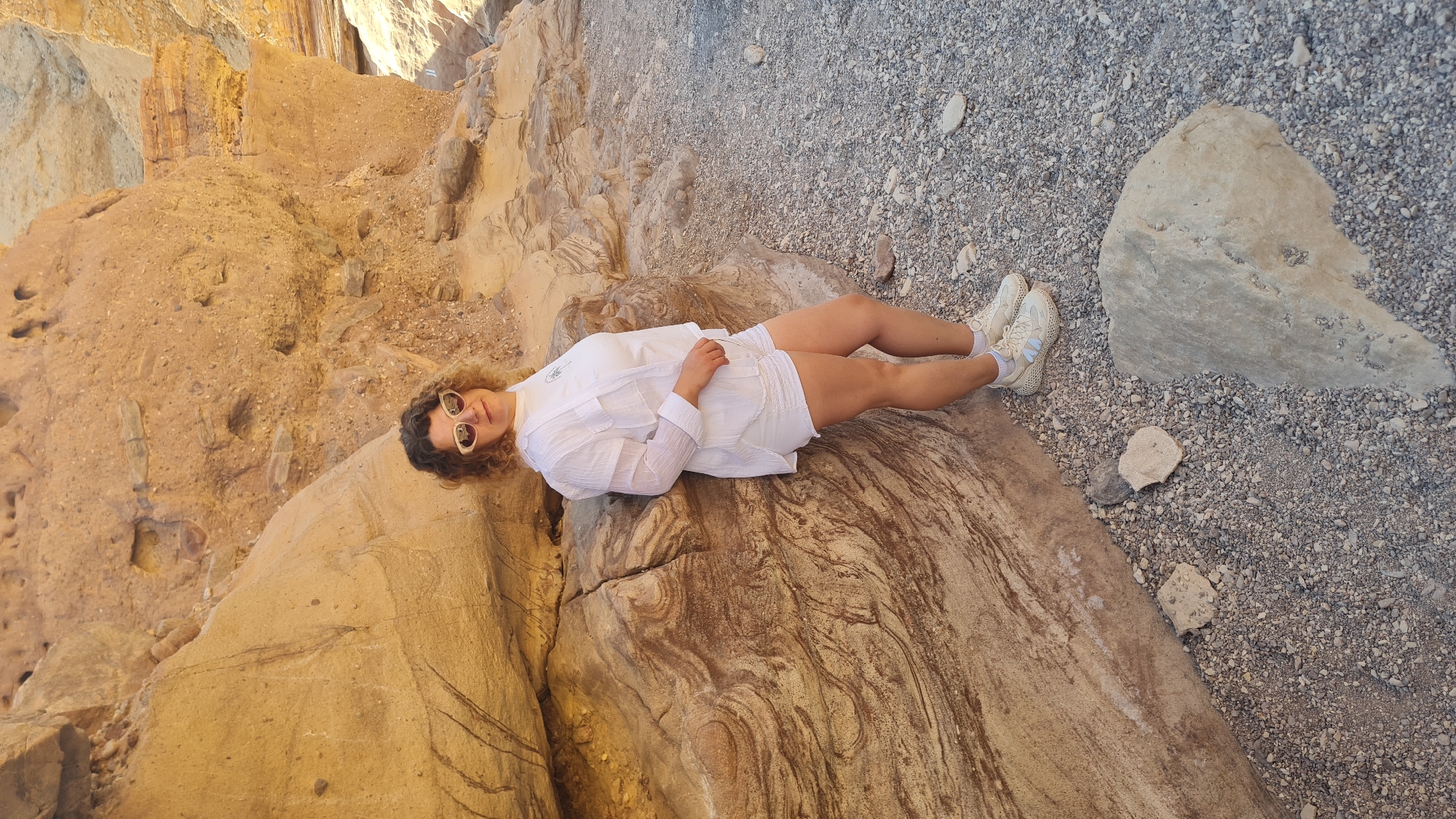 Tourists photograph desert canyon adventure in southern Israel