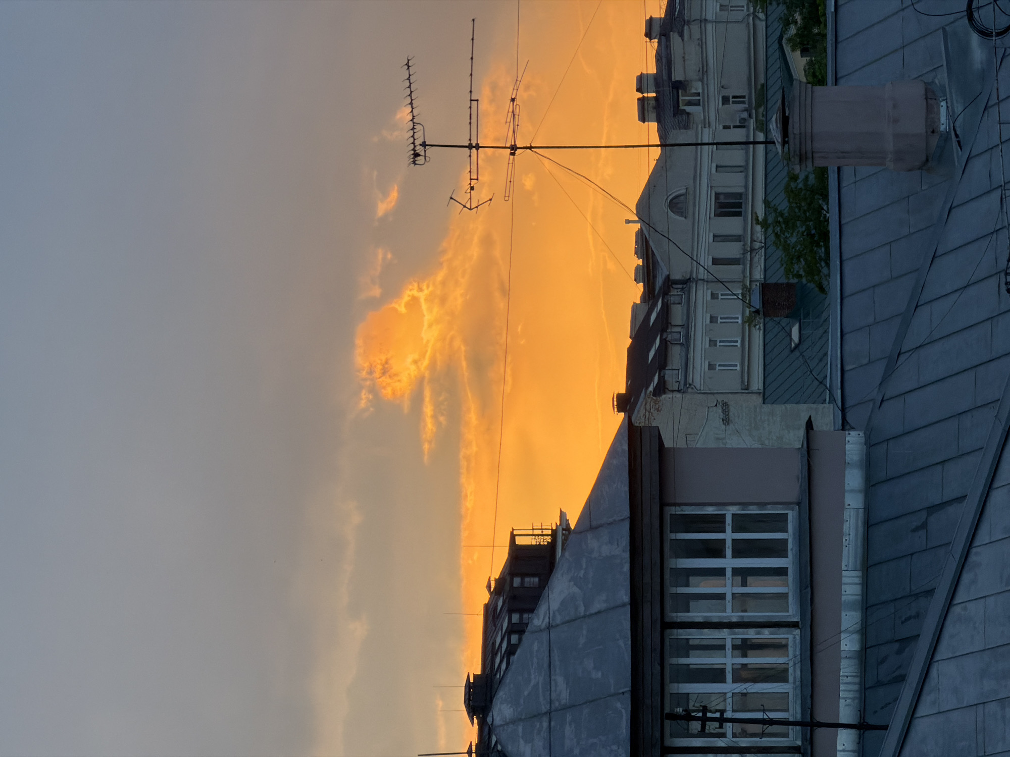 Sunset cityscape captured over Moscow rooftops