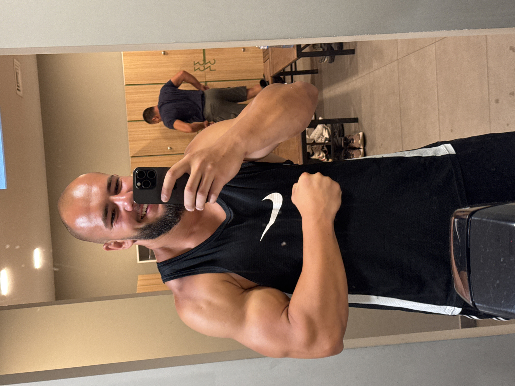 Post-workout mirror selfie series from a Sofia gym locker room