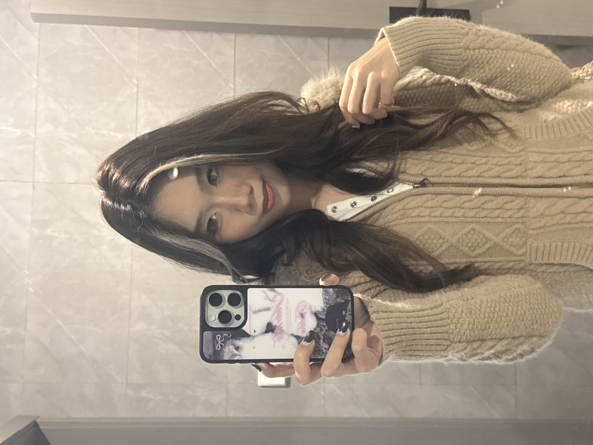 Woman takes mirror selfies in Chongqing apartment