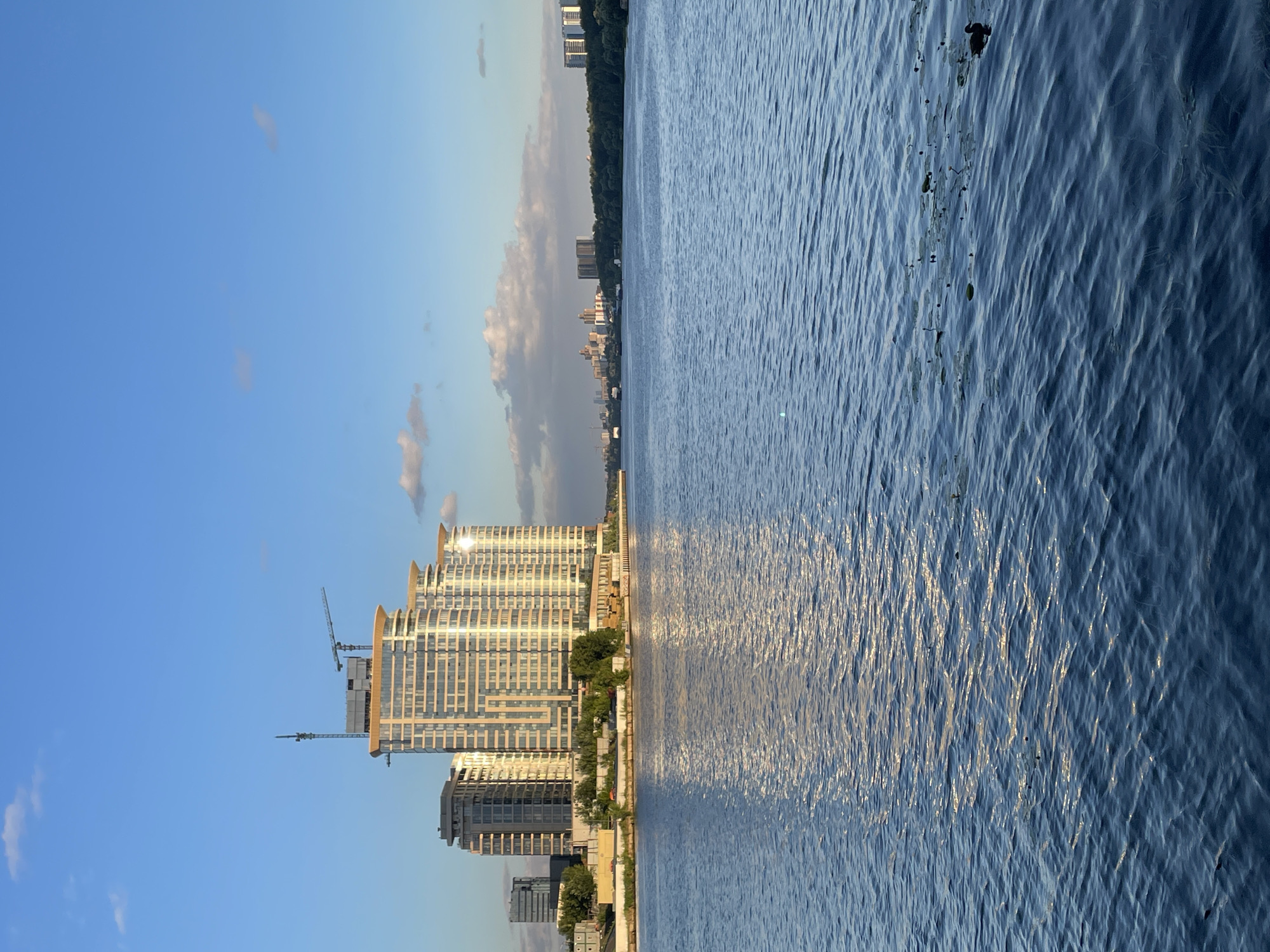 Calm blue waterfront on a summer afternoon in Khimki