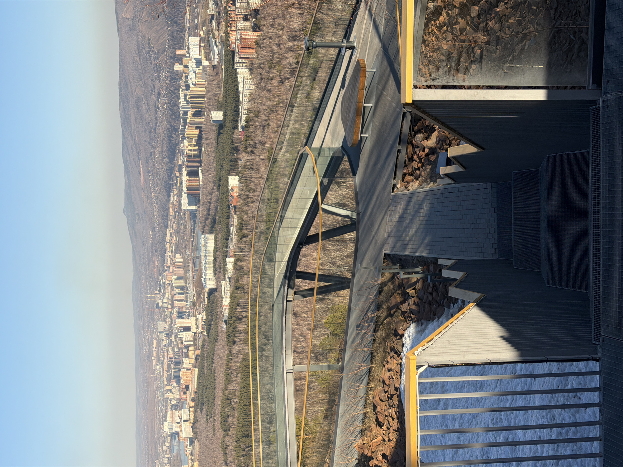 Friends enjoy sunny day sightseeing at Krasnoyarsk observation point