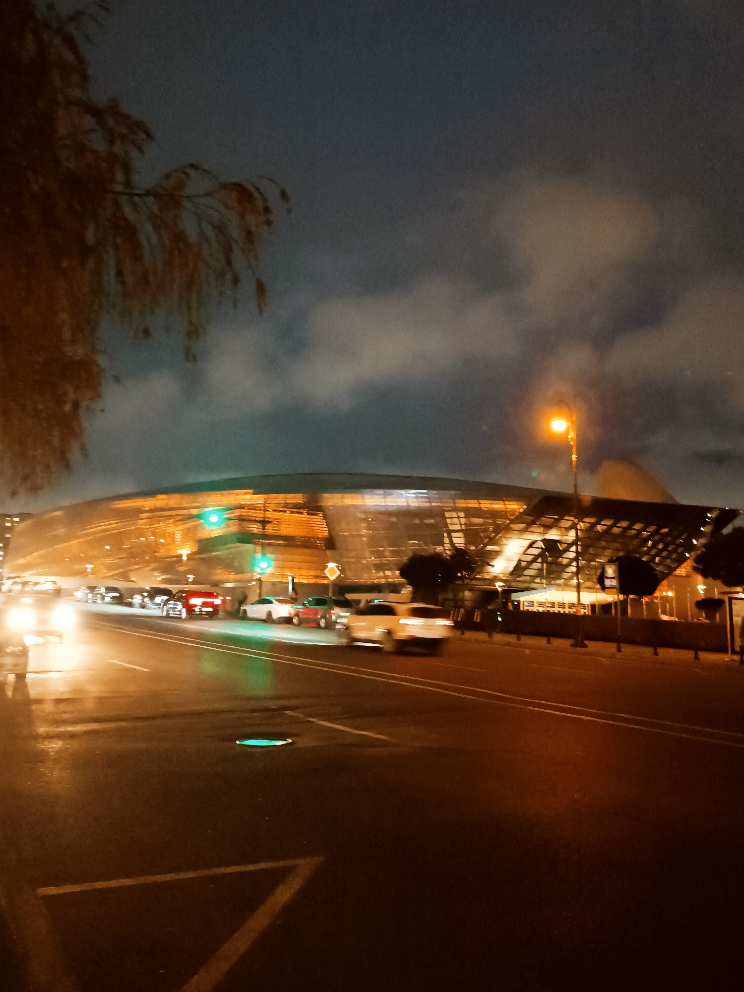 Evening street scenes documented around illuminated Baku landmarks