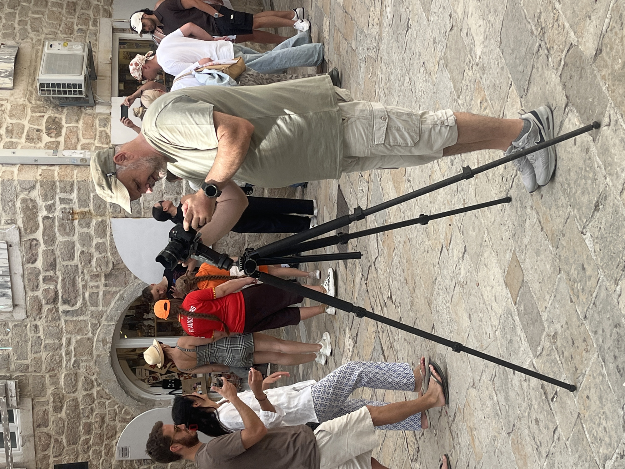Afternoon pedestrian activity documented in Budva's historic Old Town