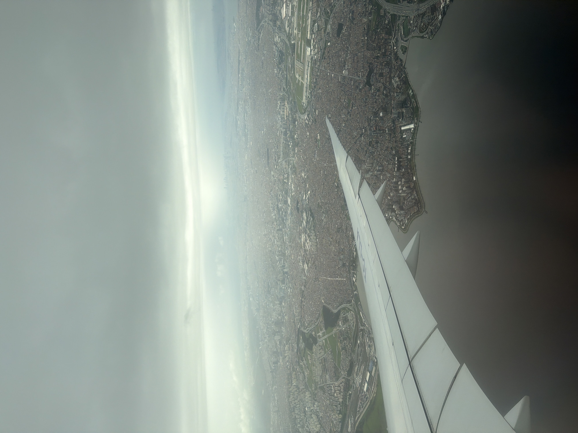 Aerial view captures hazy Arnavutköy from airplane window