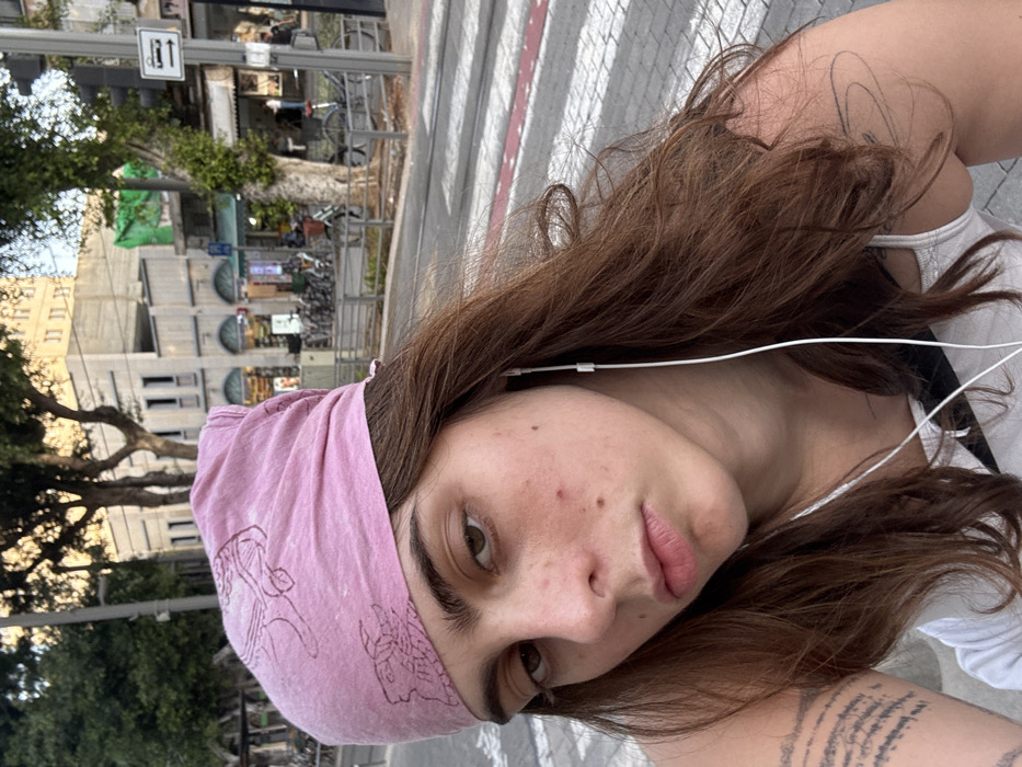 Young woman photographed in Tel Aviv selfie session