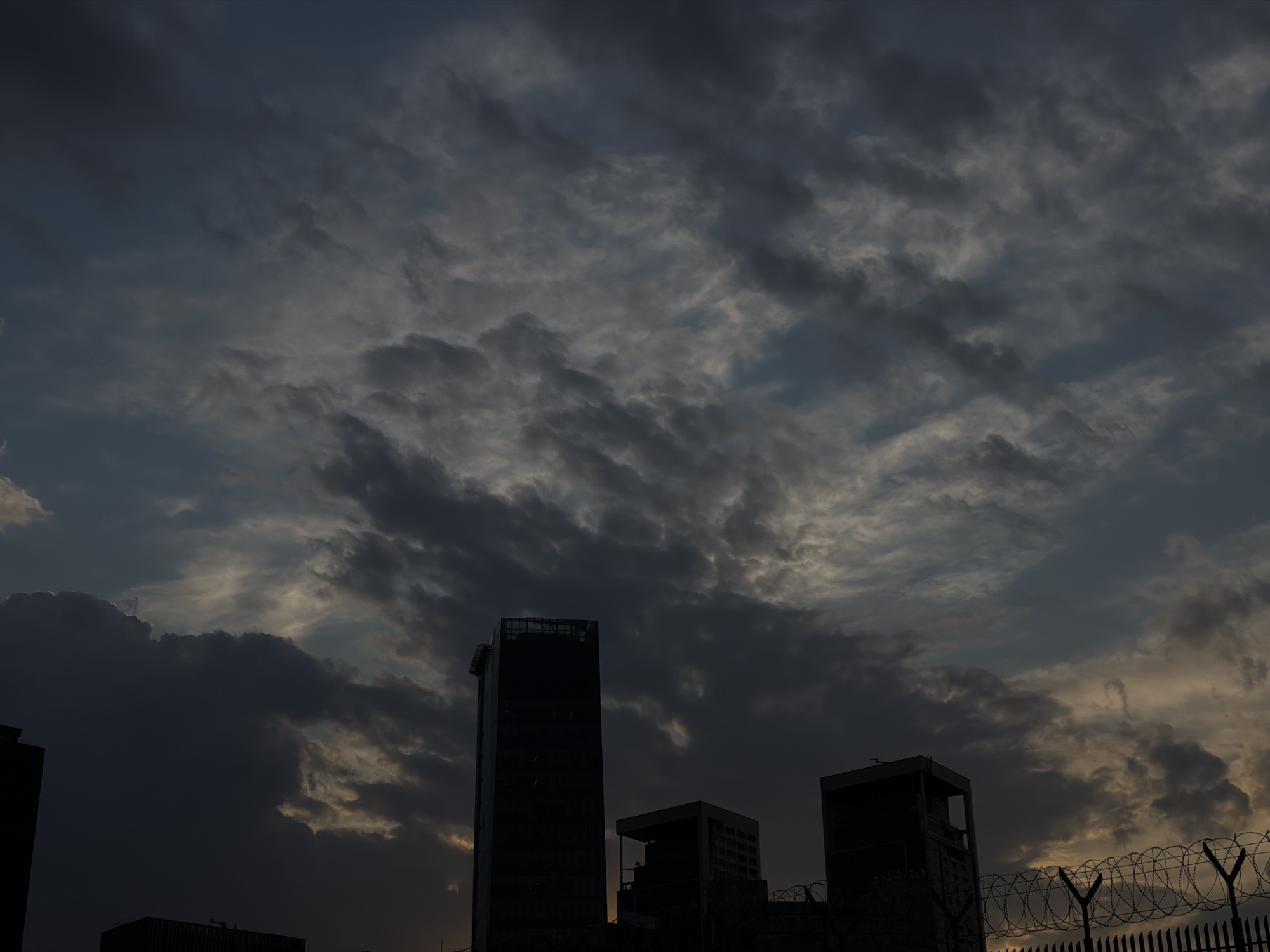 Unknown witness documents Sarıyer cityscape under cloudy skies
