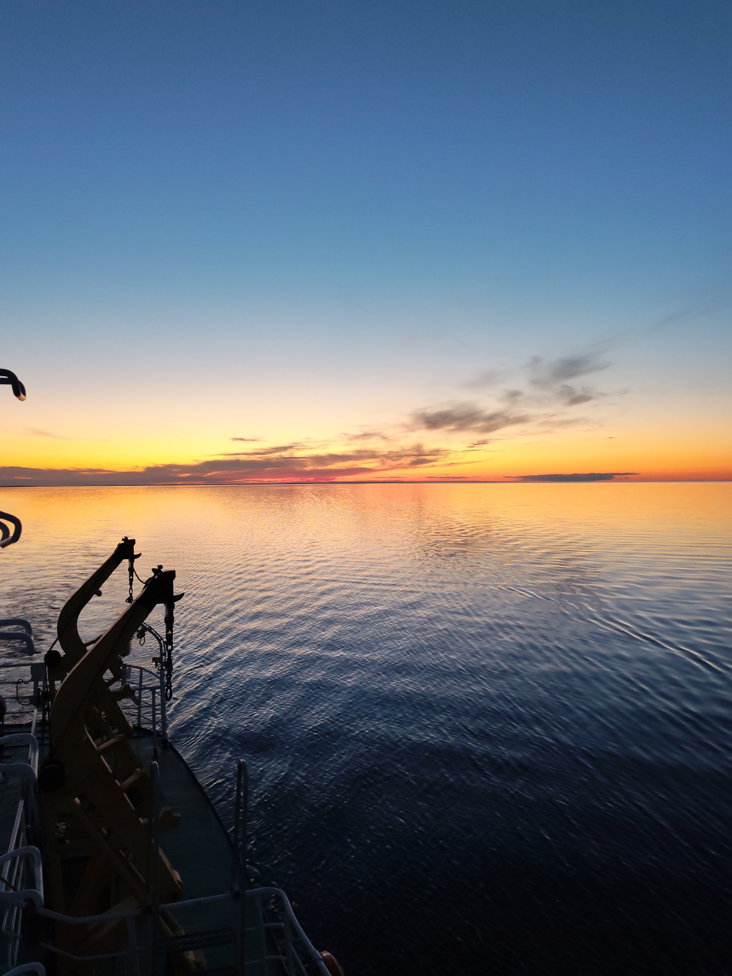 Dramatic sunset captured from ship deck in Russian waters