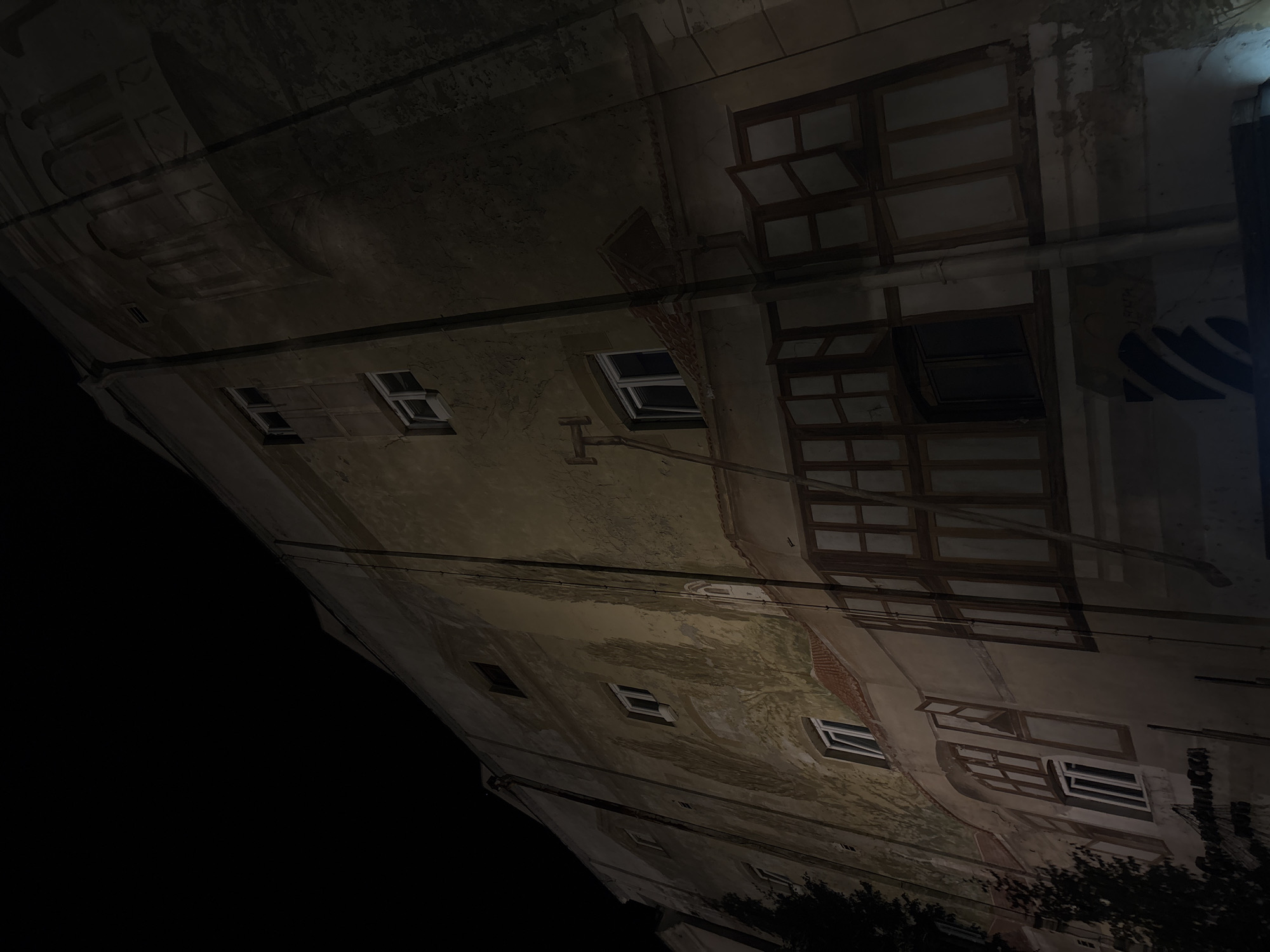 Nighttime exploration documents abandoned buildings, graffiti in Belgrade's Skadarlija district
