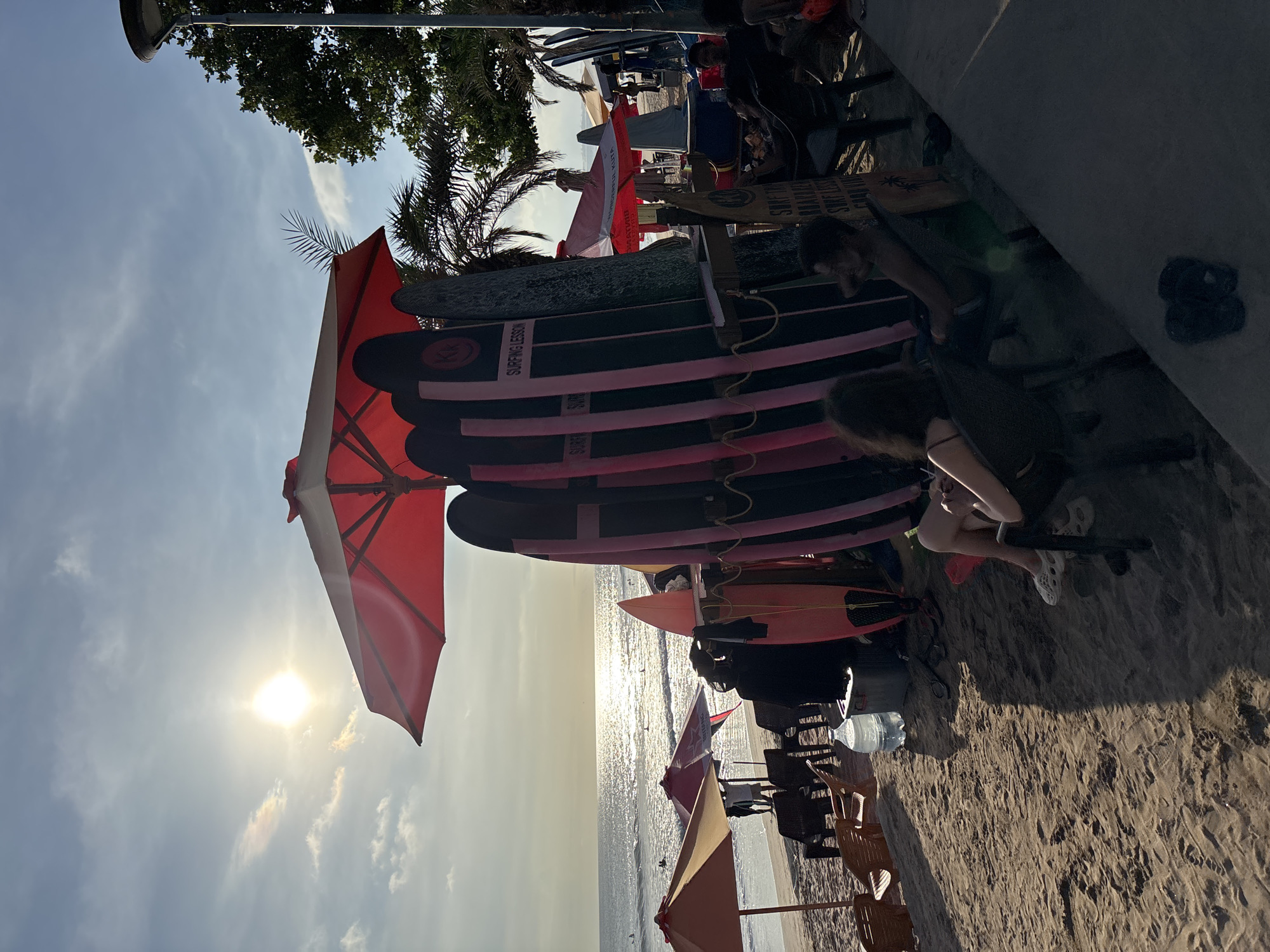 Morning activities at Kuta beachside skatepark blend surfing and skating