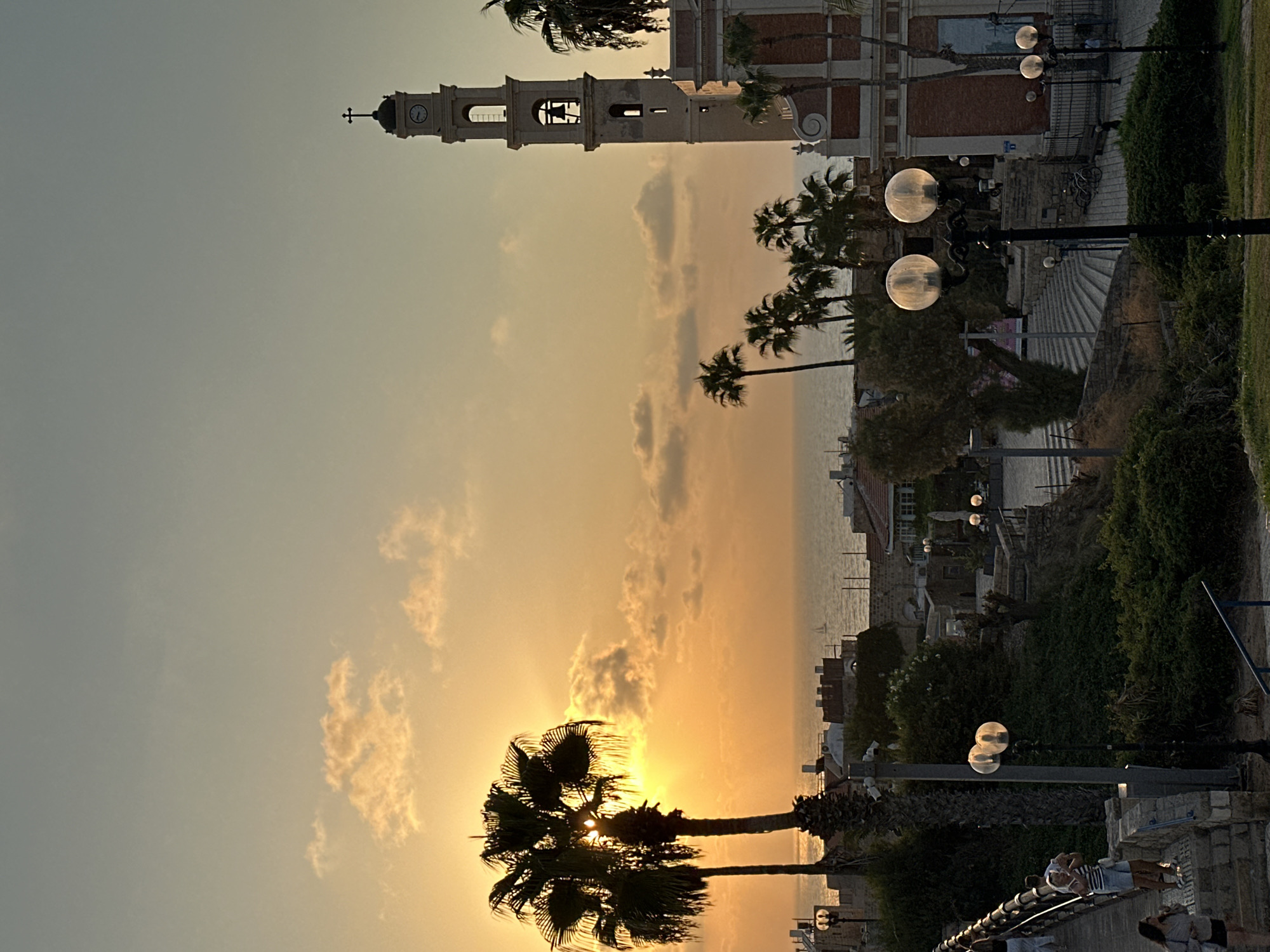 Golden hour over Jaffa's port, Tel Aviv skyline in view