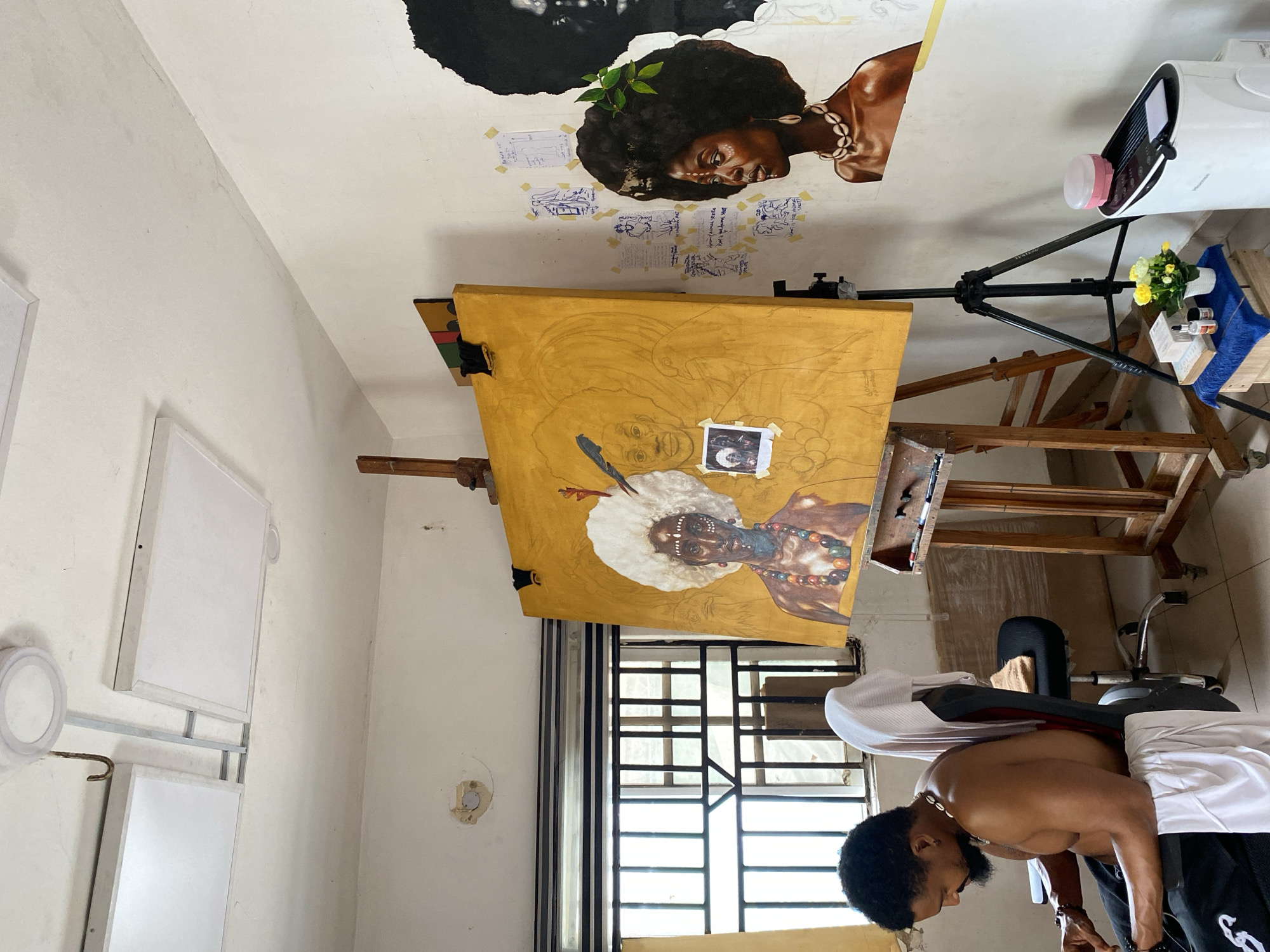 Artist creates traditional portrait paintings in Nigerian studio