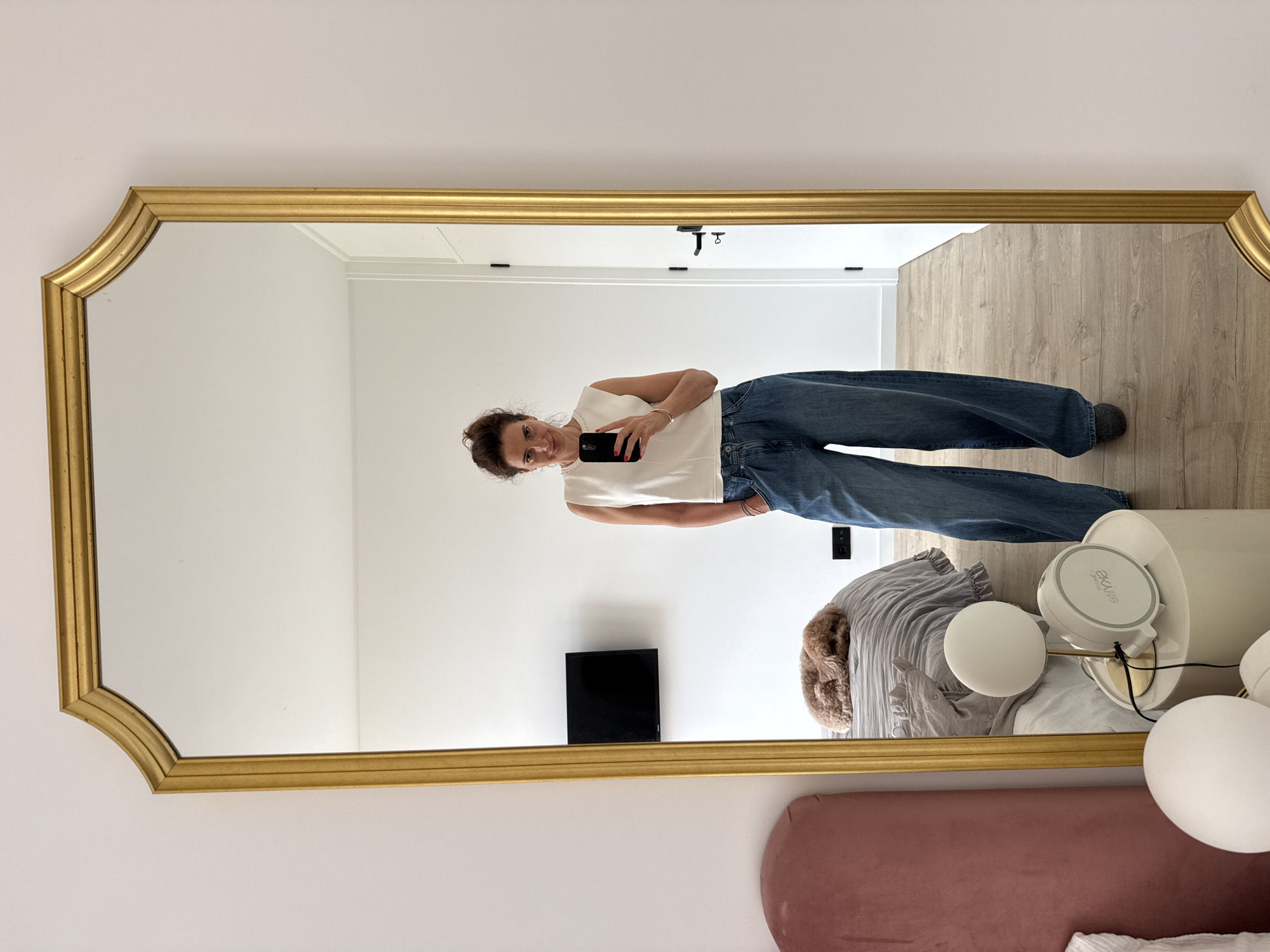 Woman takes selfie in ornate mirror, Vila Nova de Gaia