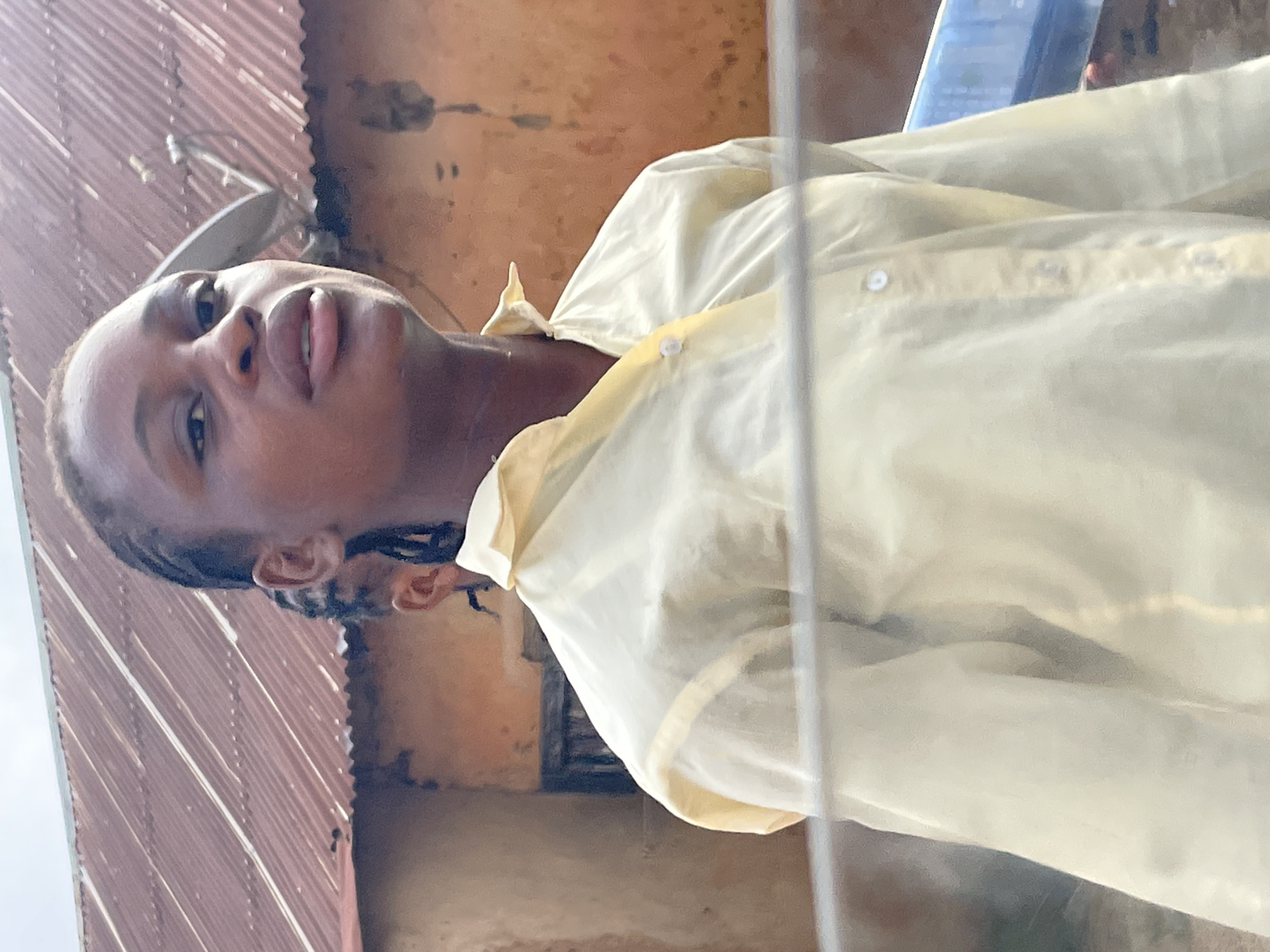 Morning street life and urban details in Bukuru, Nigeria