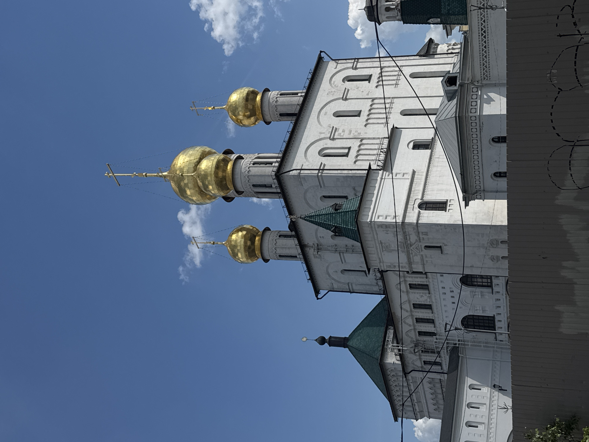 Orthodox cathedral complex with golden domes documented by witness